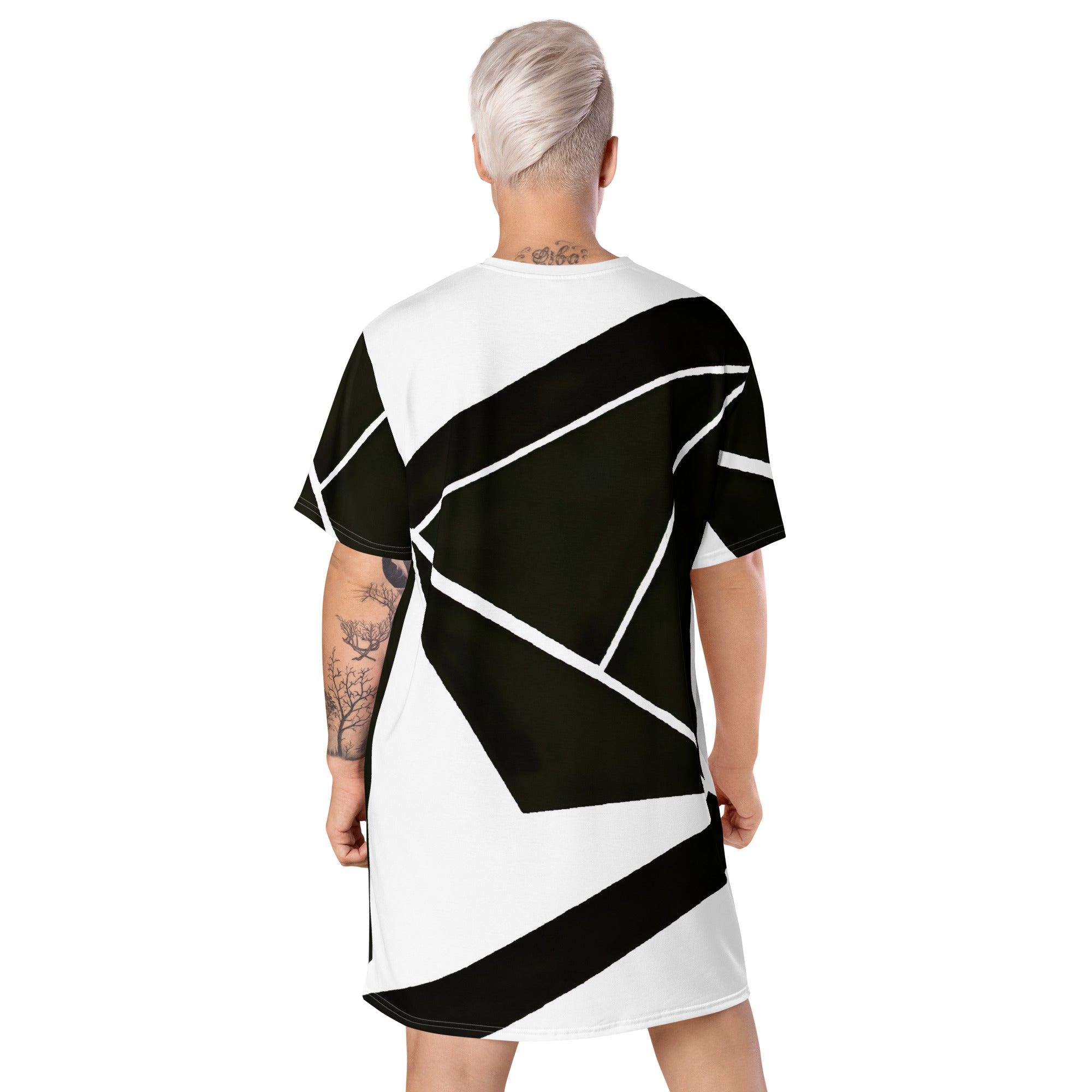 Womens Graphic T-shirt Dress featuring a black and white geometric pattern, showcasing its oversized fit and stylish design.