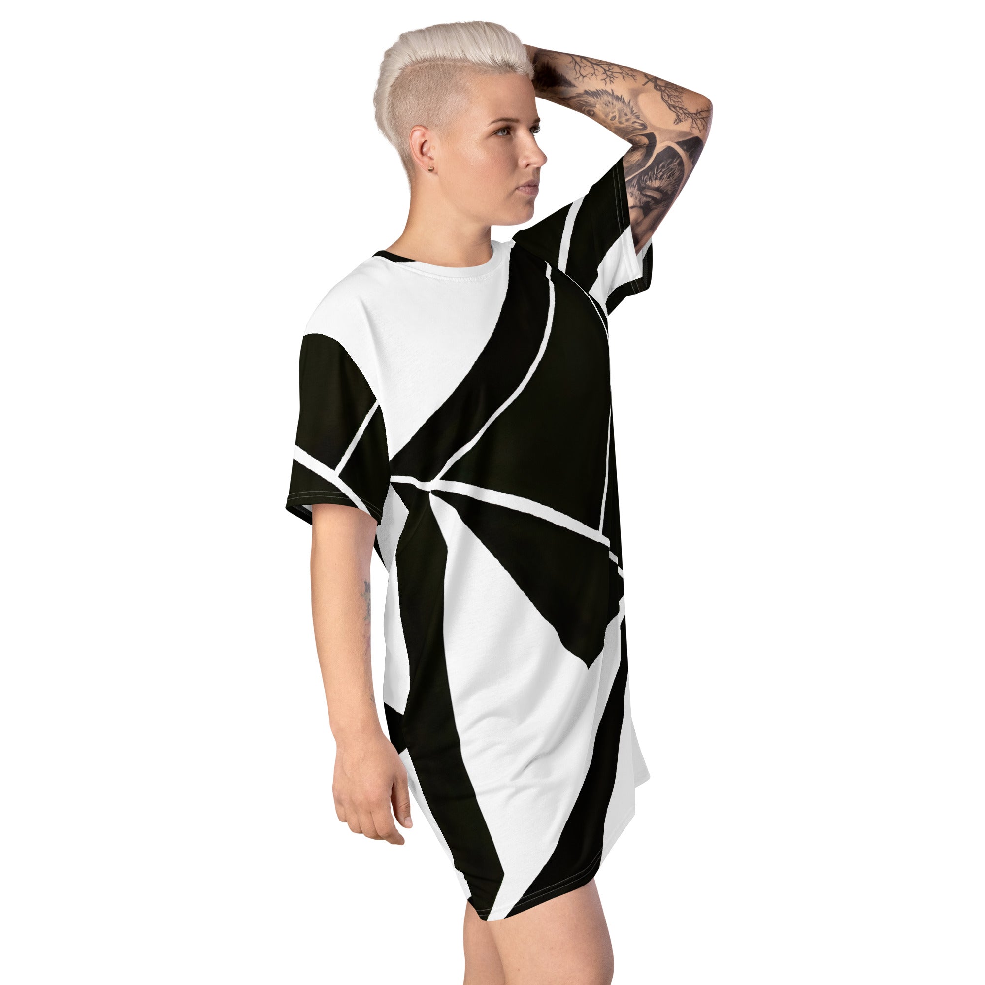 Womens Graphic T-shirt Dress featuring a black and white geometric pattern, showcasing its oversized fit and stylish design.