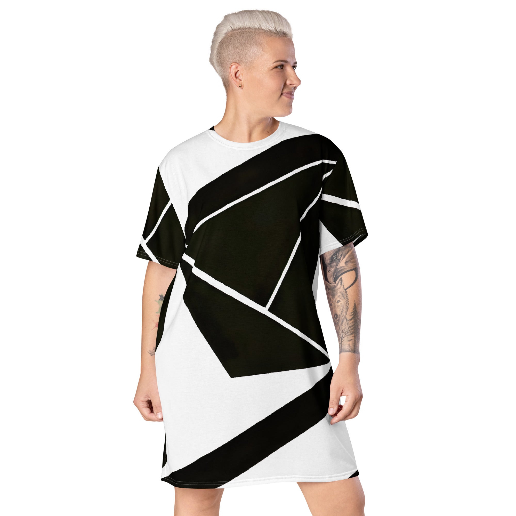 Womens Graphic T-shirt Dress featuring a black and white geometric pattern, showcasing its oversized fit and stylish design.