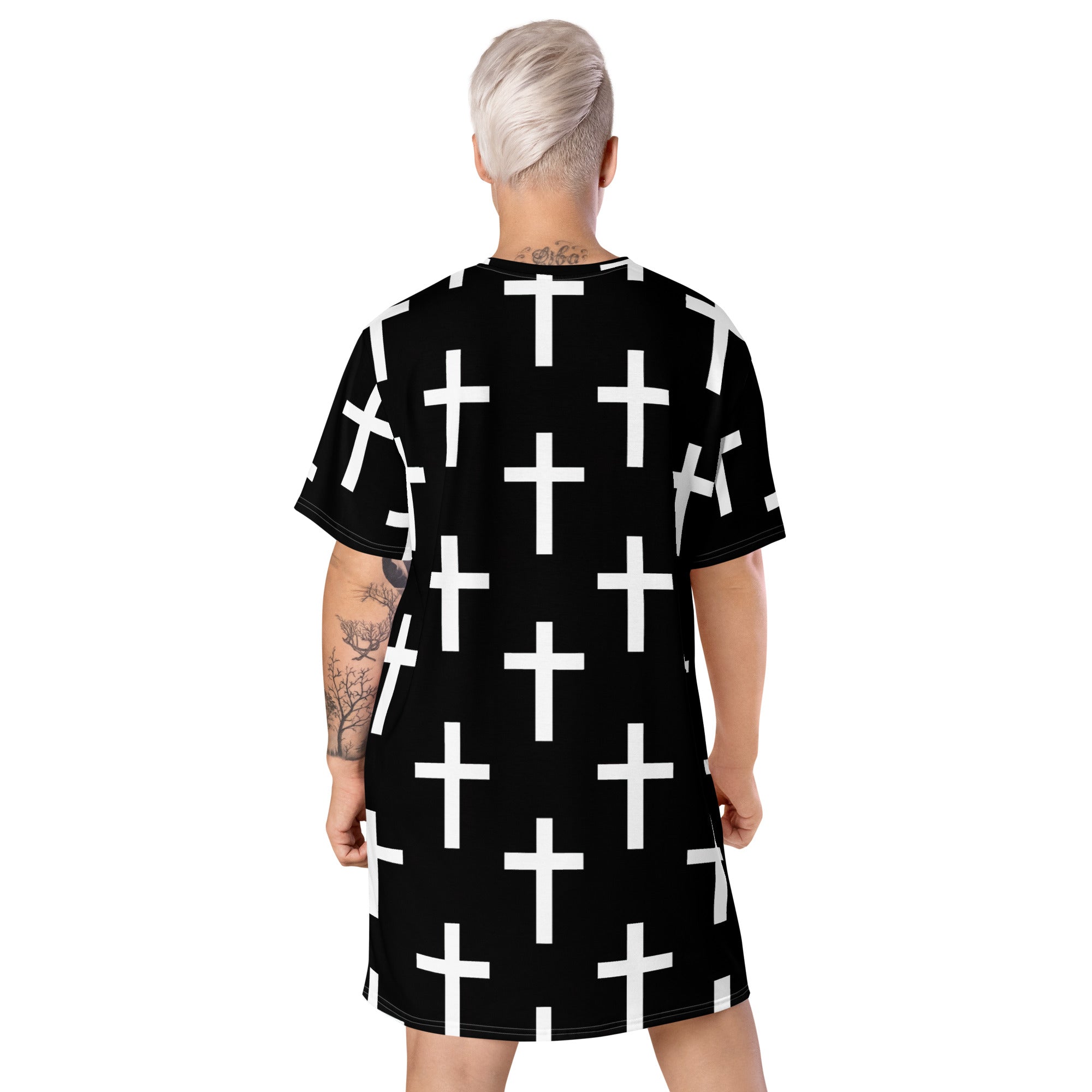 Womens Graphic T-shirt Dress featuring a black and white seamless cross print, showcasing its comfortable oversized fit and stylish design.