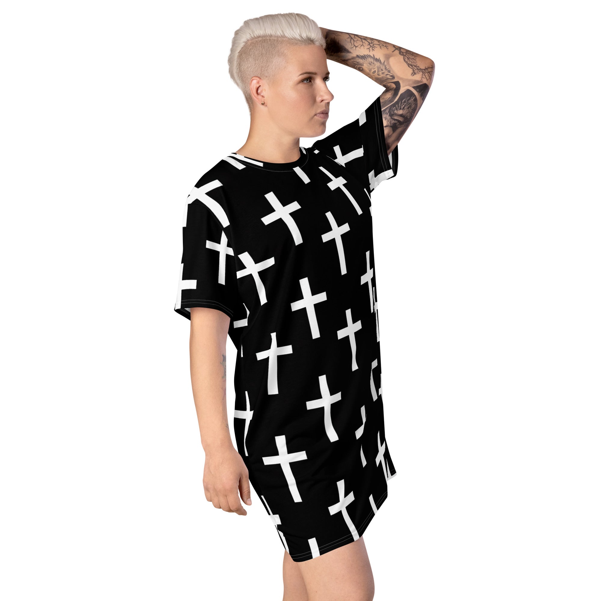 Womens Graphic T-shirt Dress featuring a black and white seamless cross print, showcasing its comfortable oversized fit and stylish design.