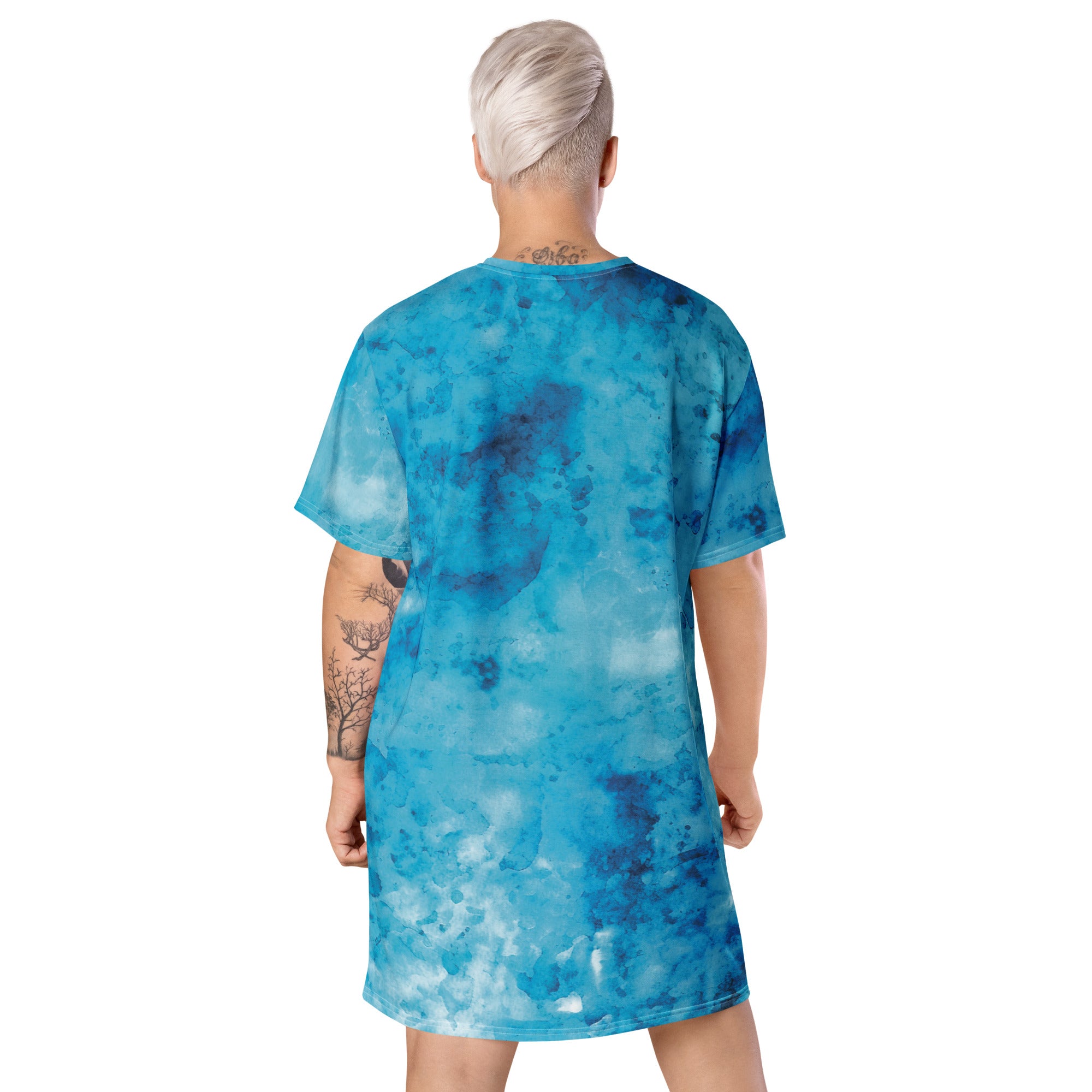 Womens Graphic T-shirt Dress featuring a blue marble print, showcasing its oversized fit and stylish design.