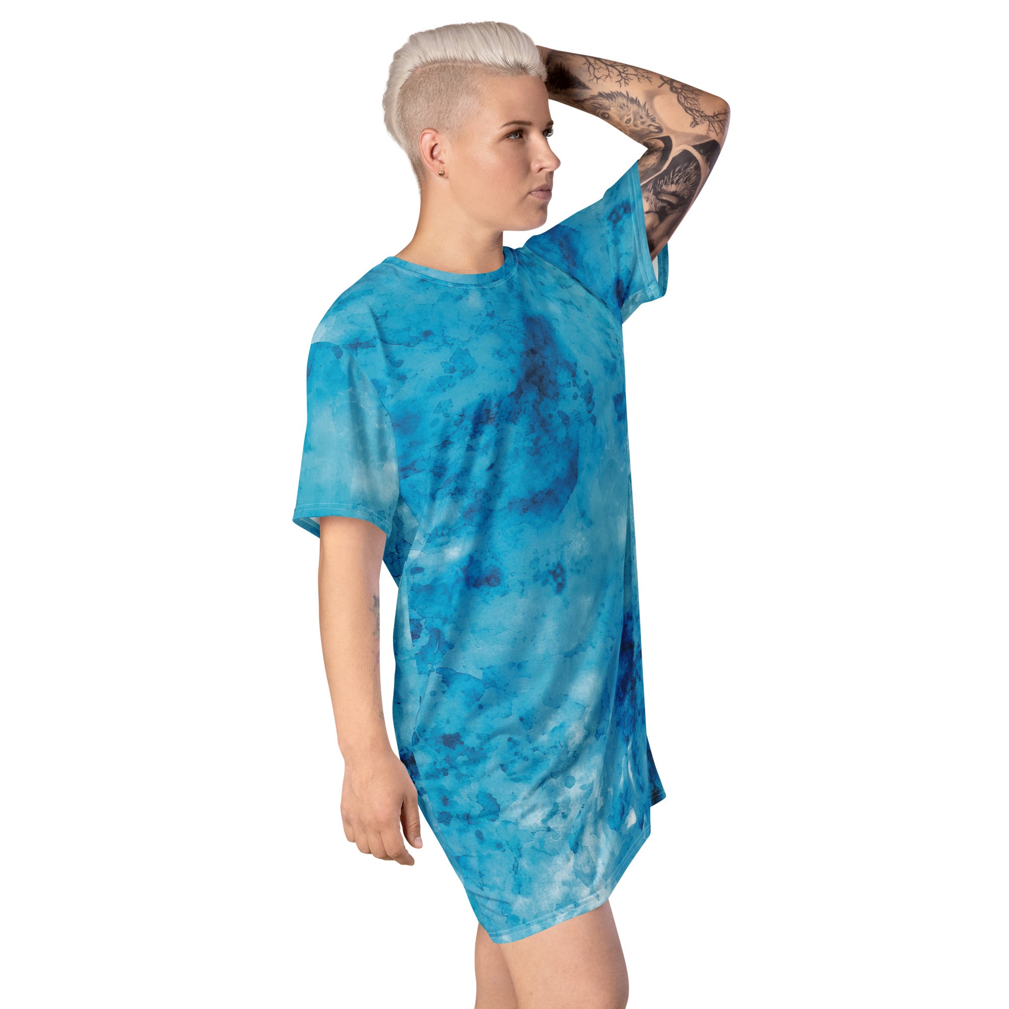 Womens Graphic T-shirt Dress featuring a blue marble print, showcasing its oversized fit and stylish design.