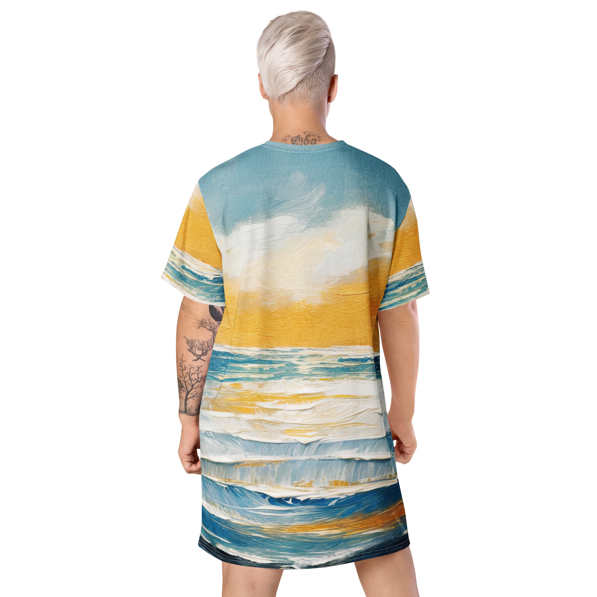 Womens Graphic T-shirt Dress featuring a Blue Ocean Golden Sunset Print, showcasing its comfortable oversized fit and stylish design.