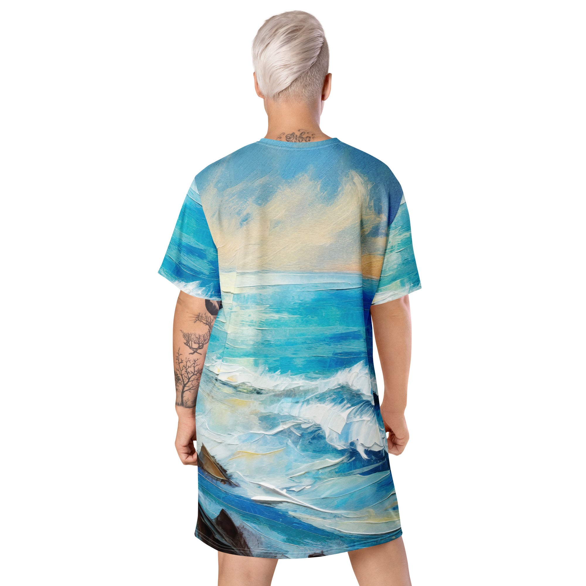 Womens Graphic T-shirt Dress featuring a vibrant Blue Ocean Print, showcasing its oversized fit and stylish design.