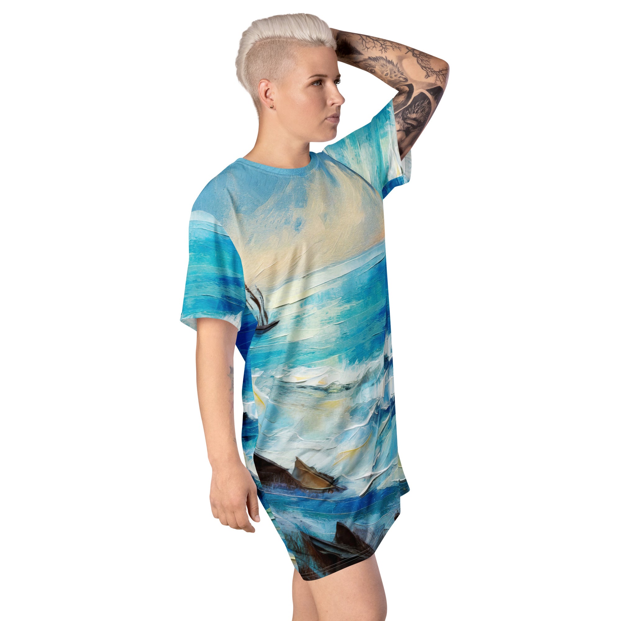 Womens Graphic T-shirt Dress featuring a vibrant Blue Ocean Print, showcasing its oversized fit and stylish design.