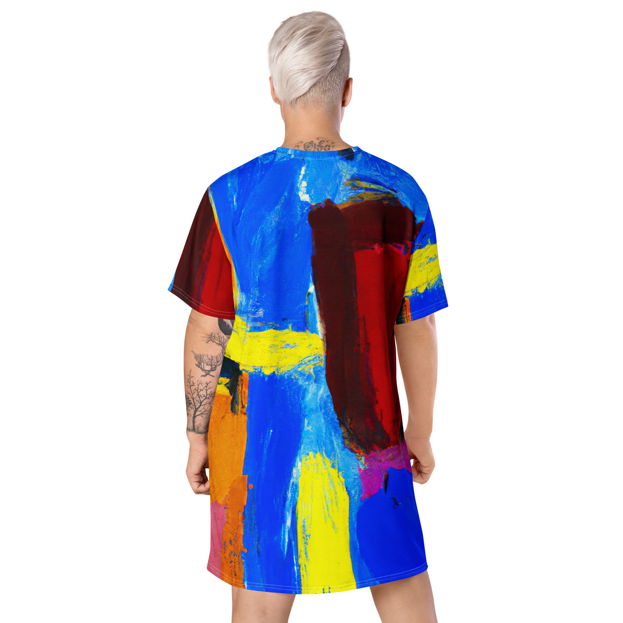 Womens Graphic T-shirt Dress featuring a vibrant blue and red abstract pattern, showcasing its oversized fit and stylish design.