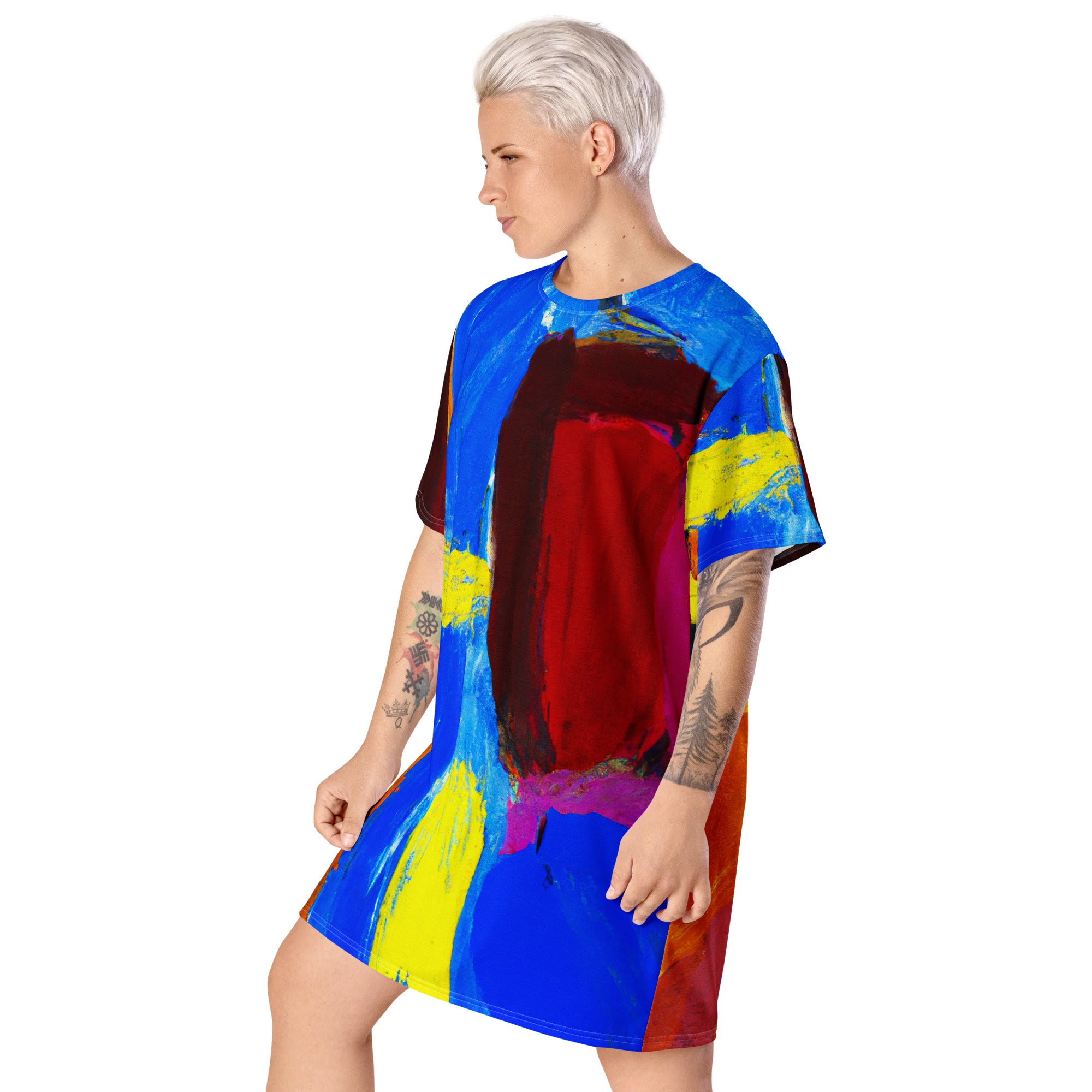 Womens Graphic T-shirt Dress featuring a vibrant blue and red abstract pattern, showcasing its oversized fit and stylish design.