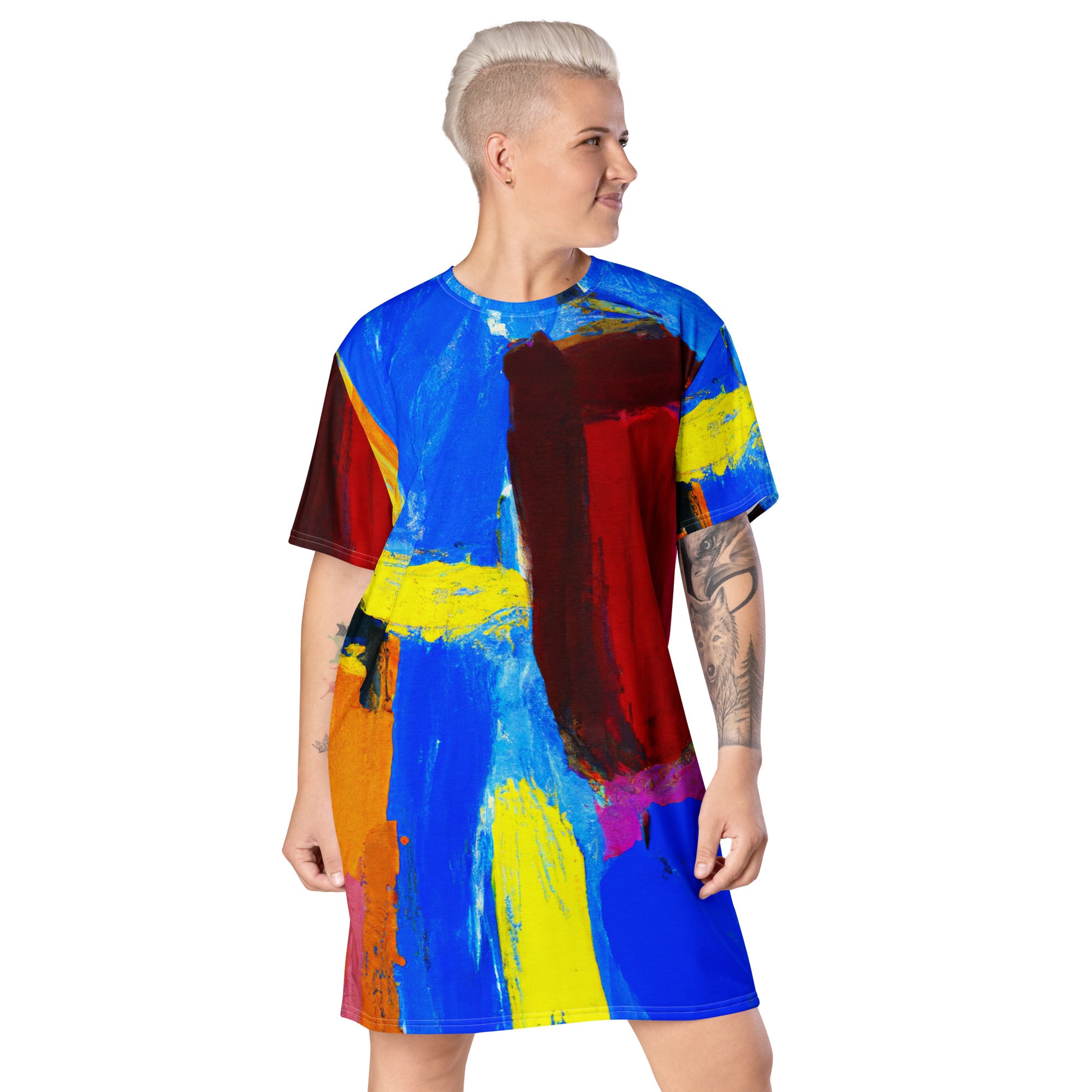 Womens Graphic T-shirt Dress featuring a vibrant blue and red abstract pattern, showcasing its oversized fit and stylish design.