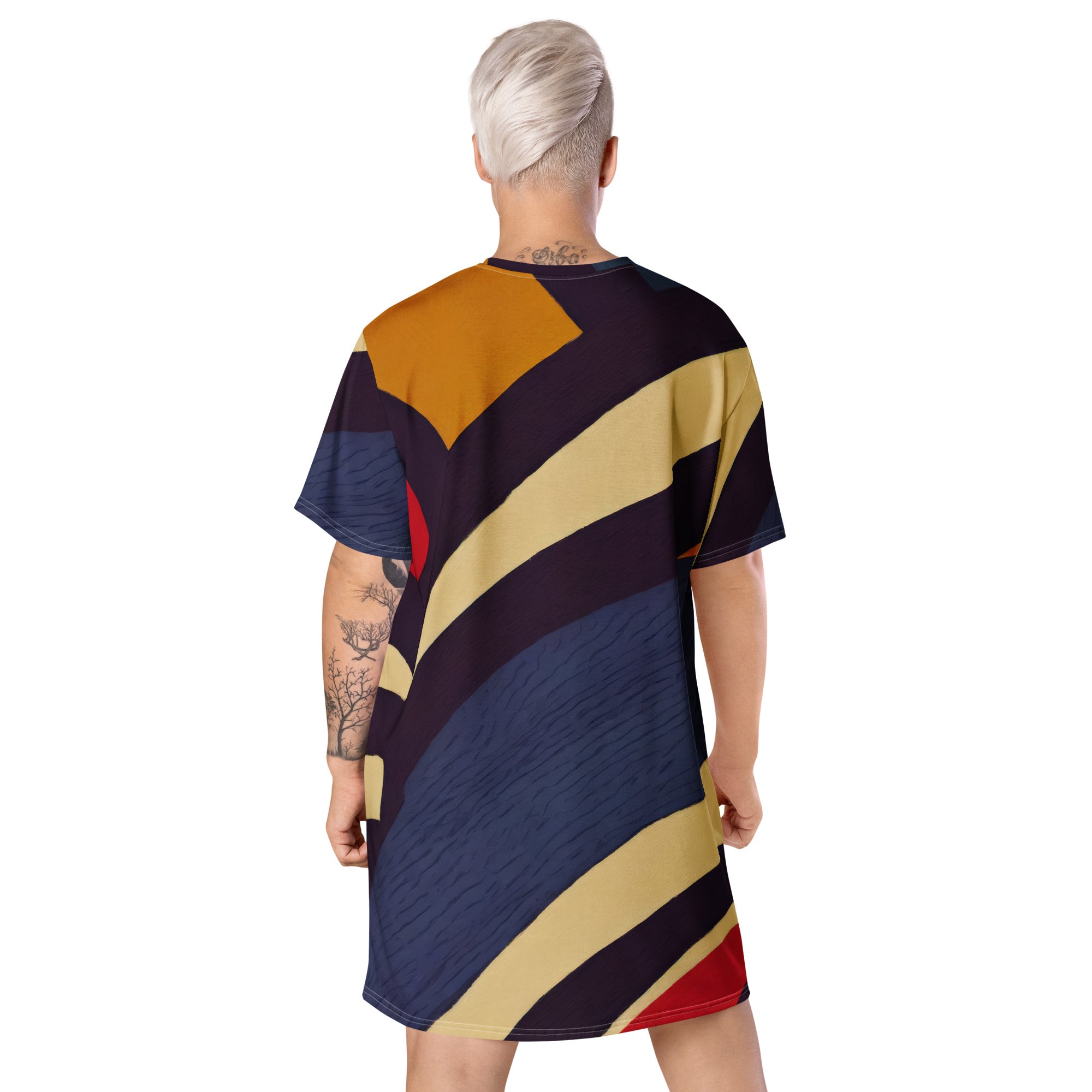 Womens Graphic T-shirt Dress featuring a stylish brown, red, and blue colorblock design, showcasing its comfortable oversized fit and unique style.