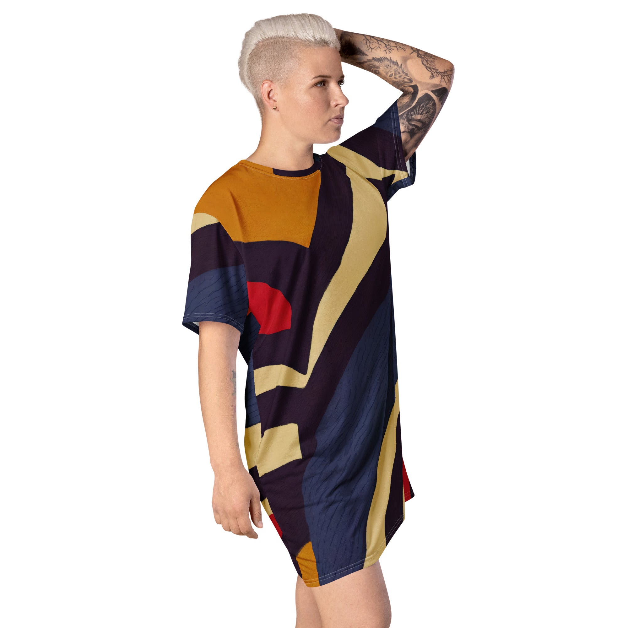 Womens Graphic T-shirt Dress featuring a stylish brown, red, and blue colorblock design, showcasing its comfortable oversized fit and unique style.