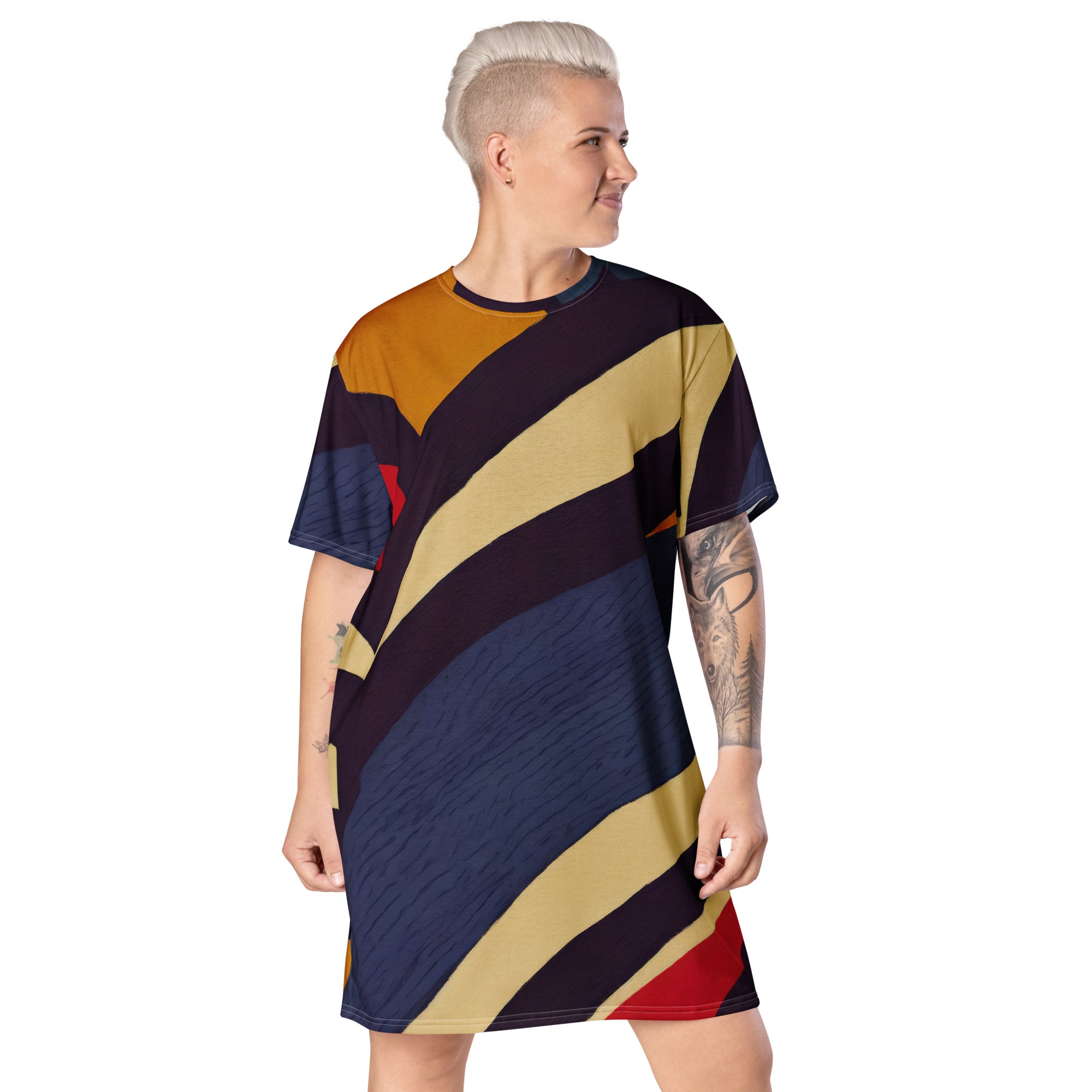 Womens Graphic T-shirt Dress featuring a stylish brown, red, and blue colorblock design, showcasing its comfortable oversized fit and unique style.