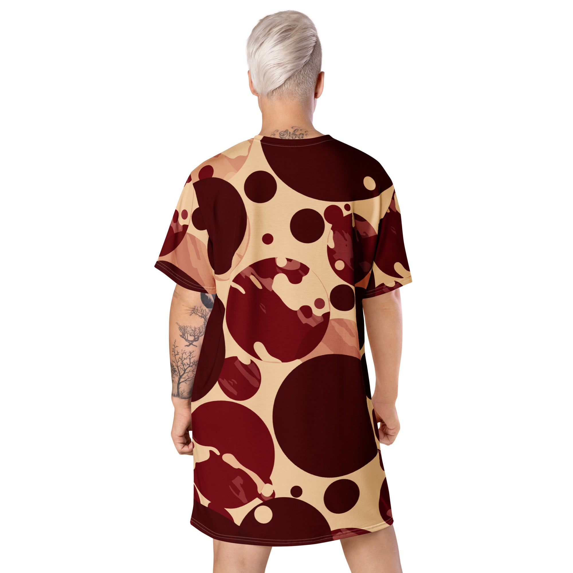 Womens Graphic T-shirt Dress featuring a burgundy and beige circular print, showcasing its oversized fit and stylish design.