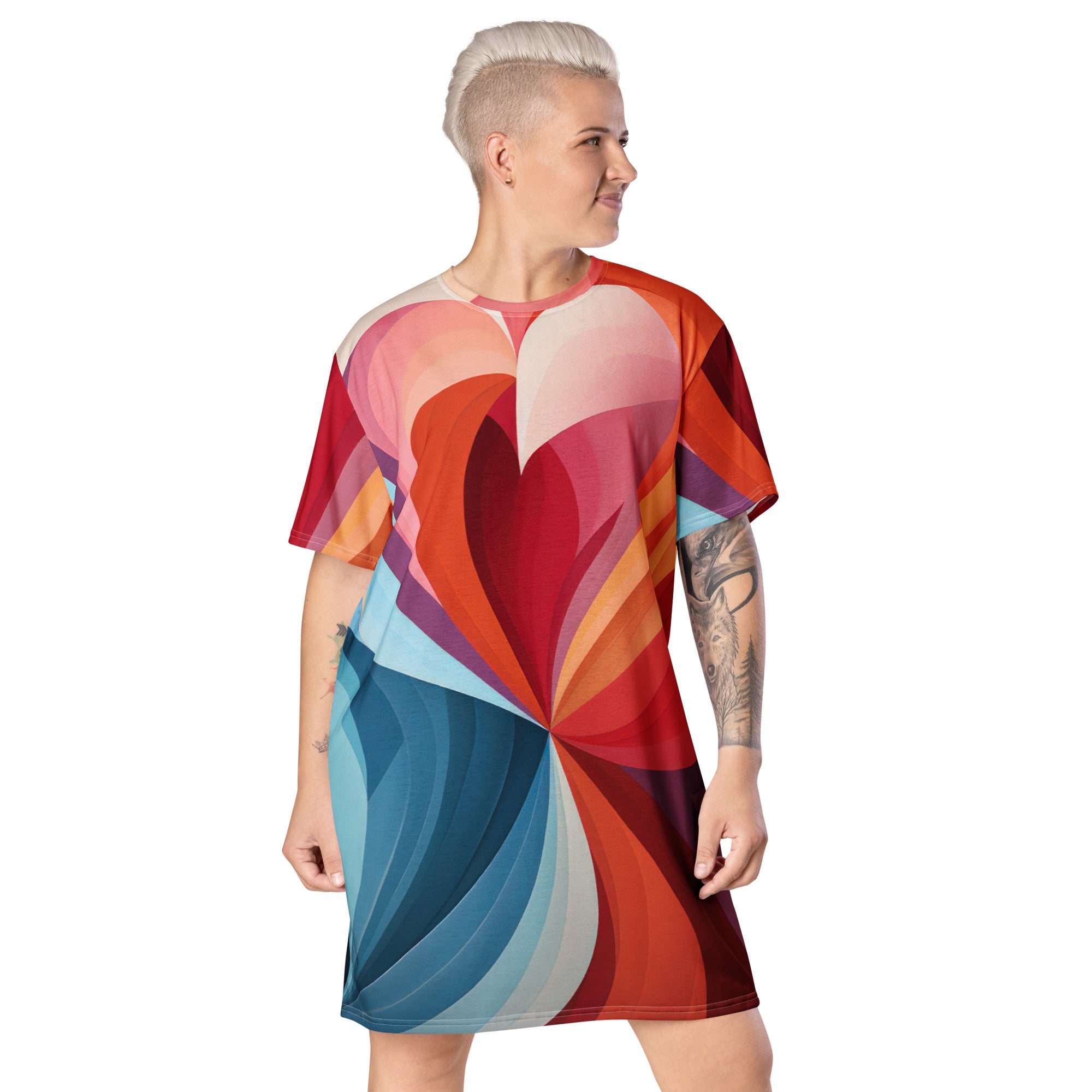 Womens Graphic T-shirt Dress featuring a vibrant multicolor heart print, showcasing its oversized fit and stylish design.