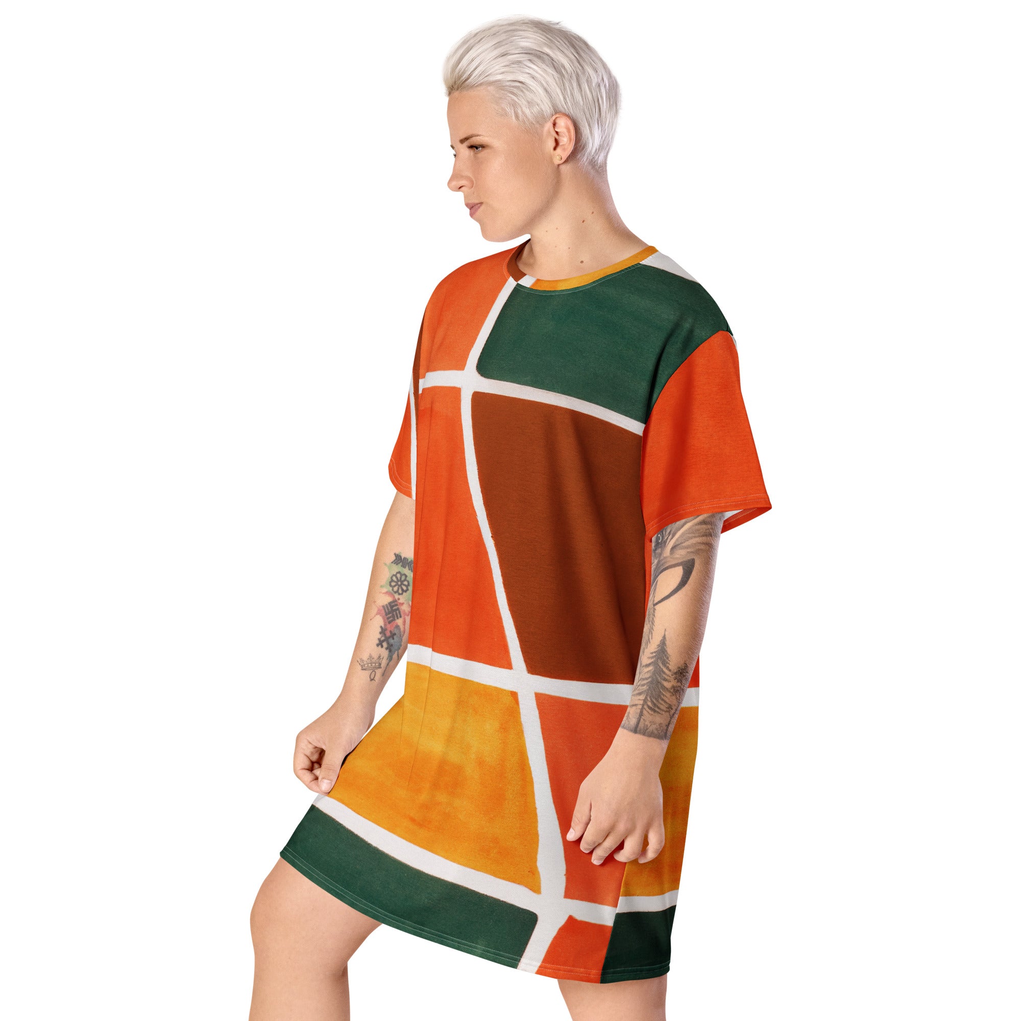 Womens Graphic T-shirt Dress featuring an orange and green boho pattern, showcasing its oversized fit and stylish design.