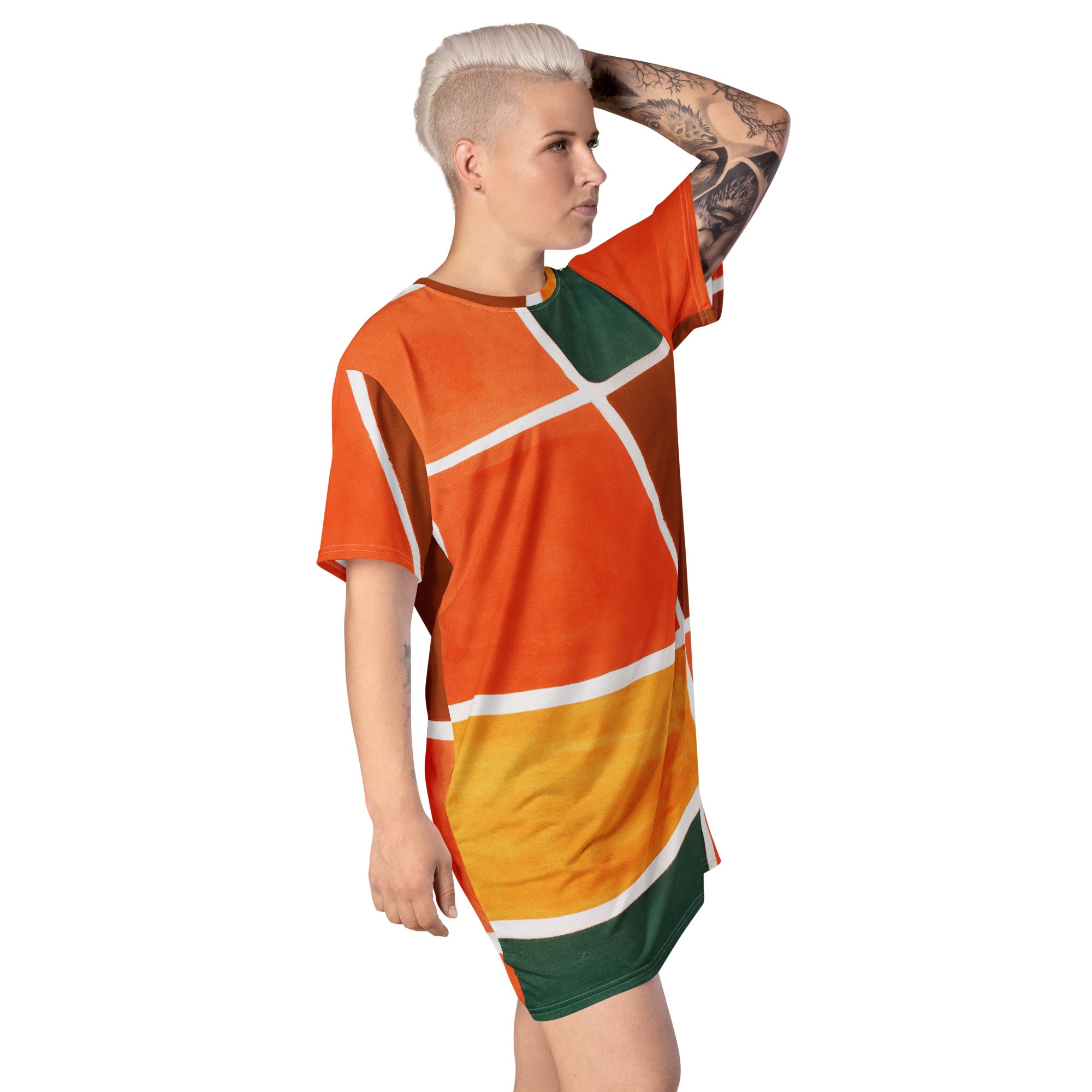 Womens Graphic T-shirt Dress featuring an orange and green boho pattern, showcasing its oversized fit and stylish design.