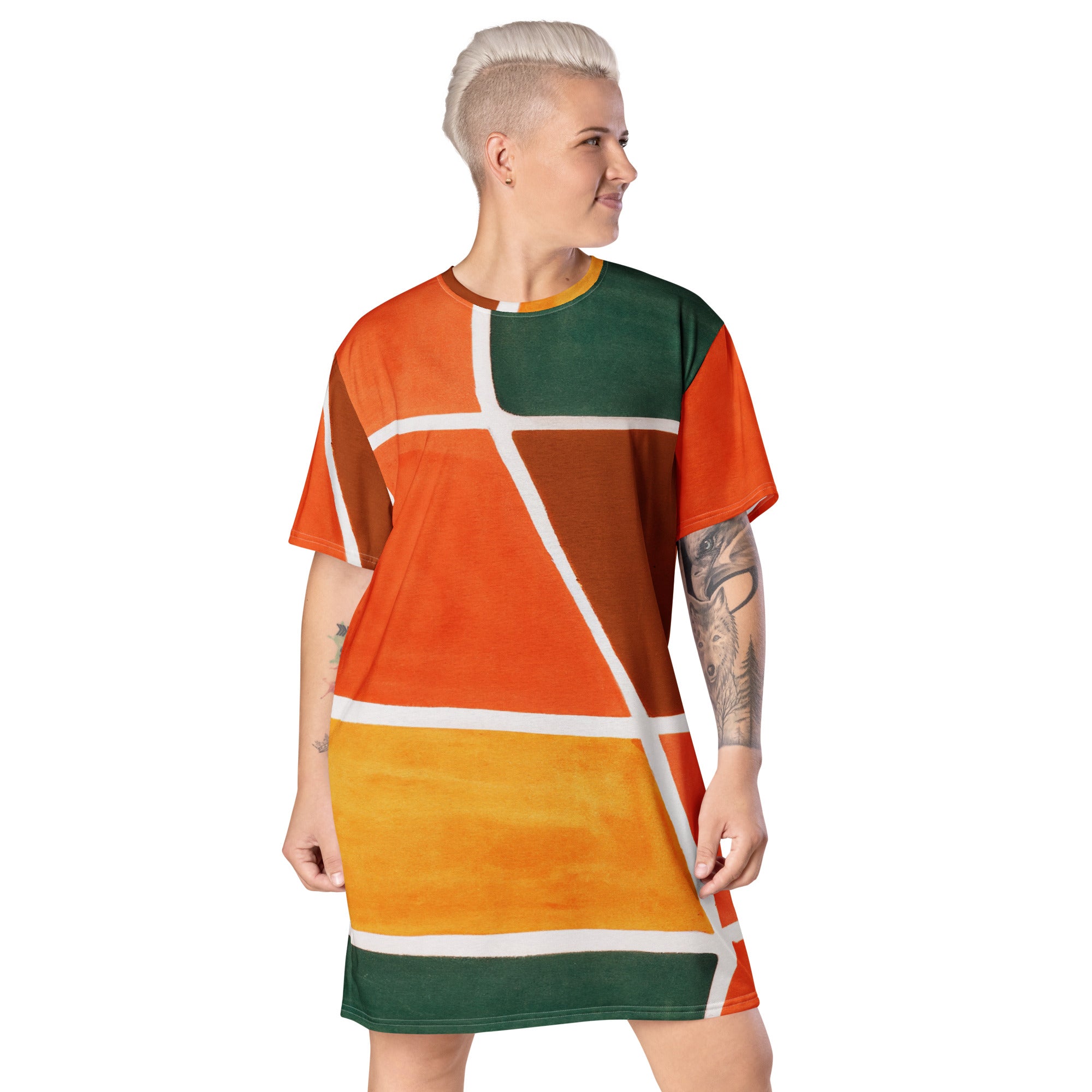 Womens Graphic T-shirt Dress featuring an orange and green boho pattern, showcasing its oversized fit and stylish design.