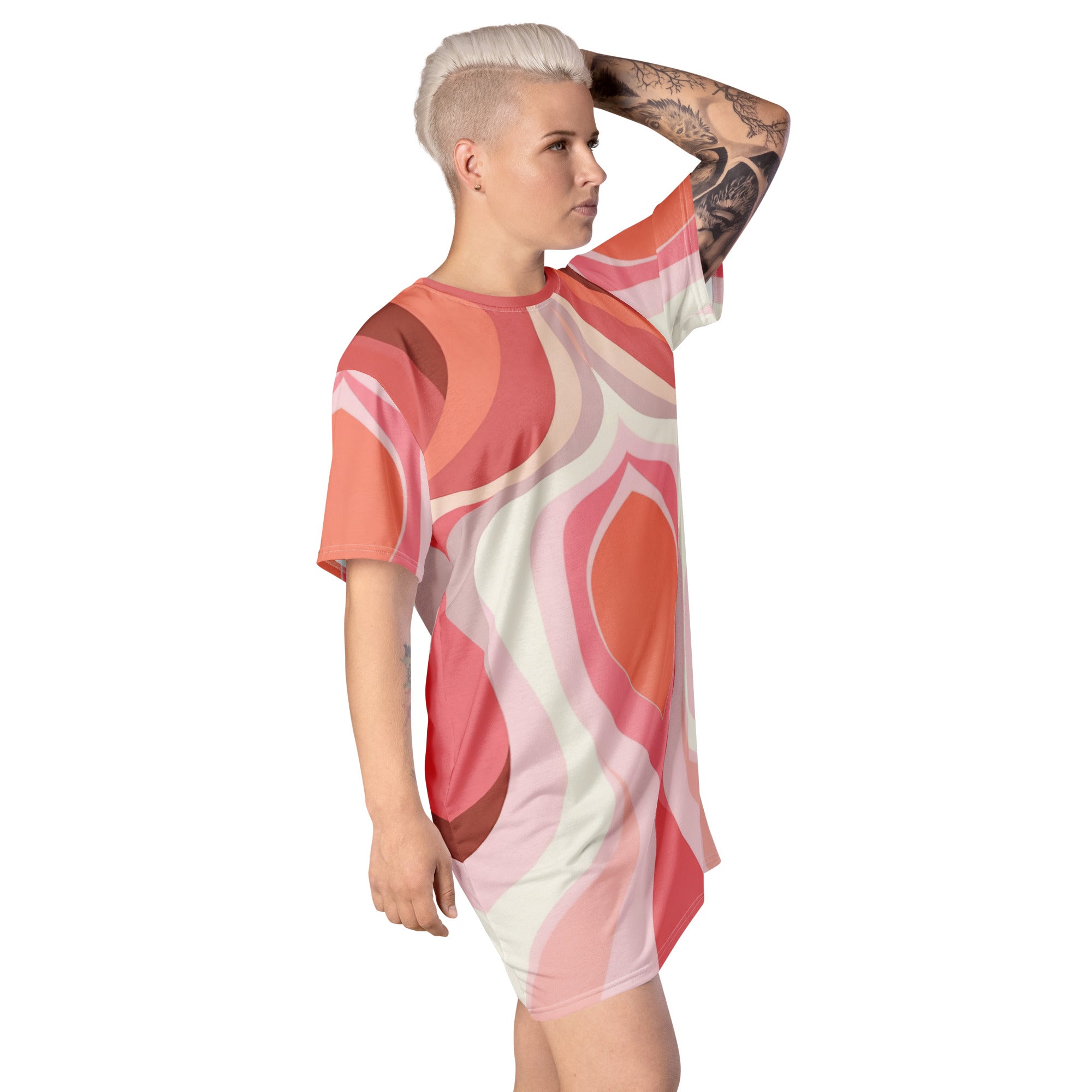 Womens Graphic T-shirt Dress in pink and white with boho swirl lines pattern, showcasing its oversized fit and stylish design.