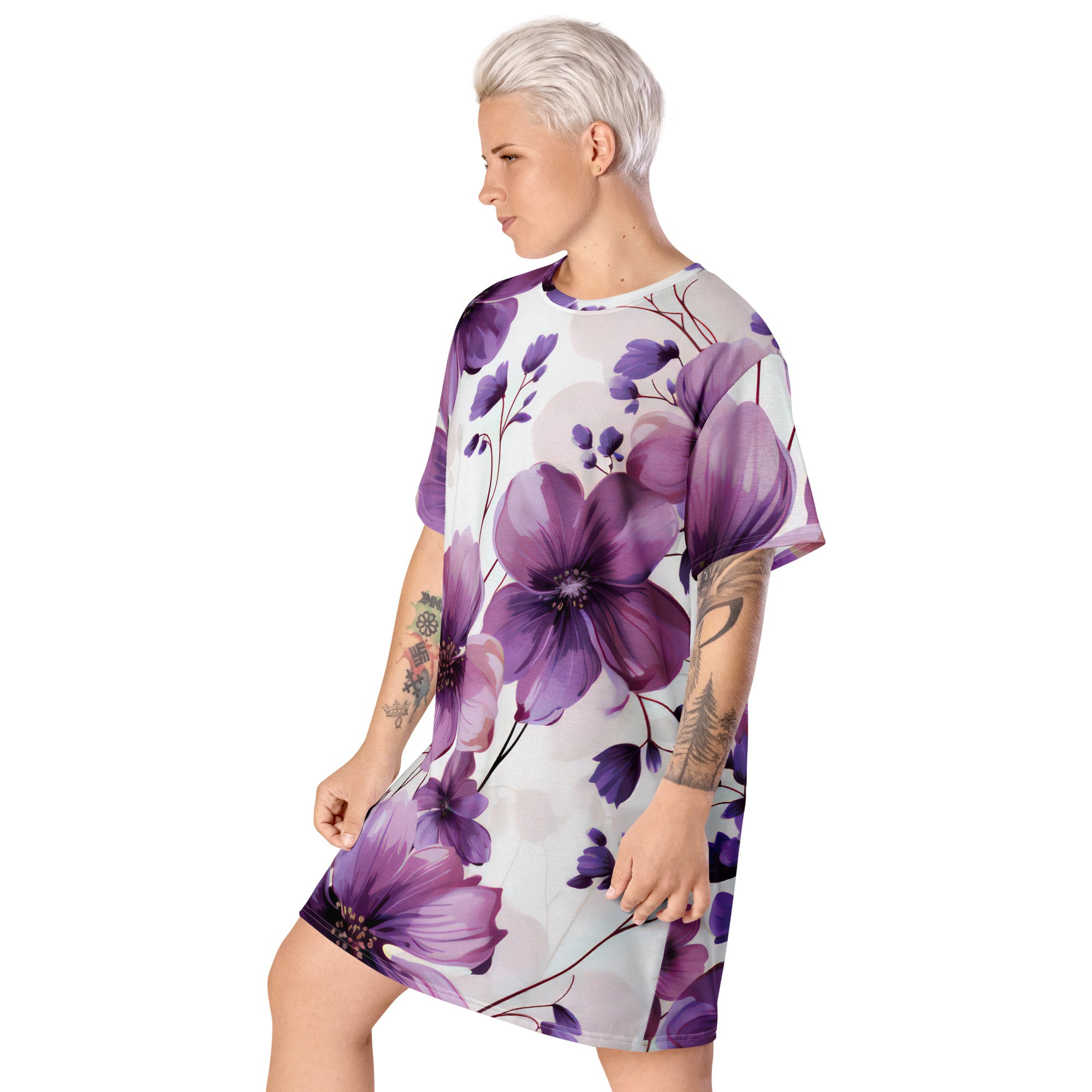 Womens Graphic T-shirt Dress featuring a vibrant purple botanical blooms design, showcasing its oversized fit and stylish look.