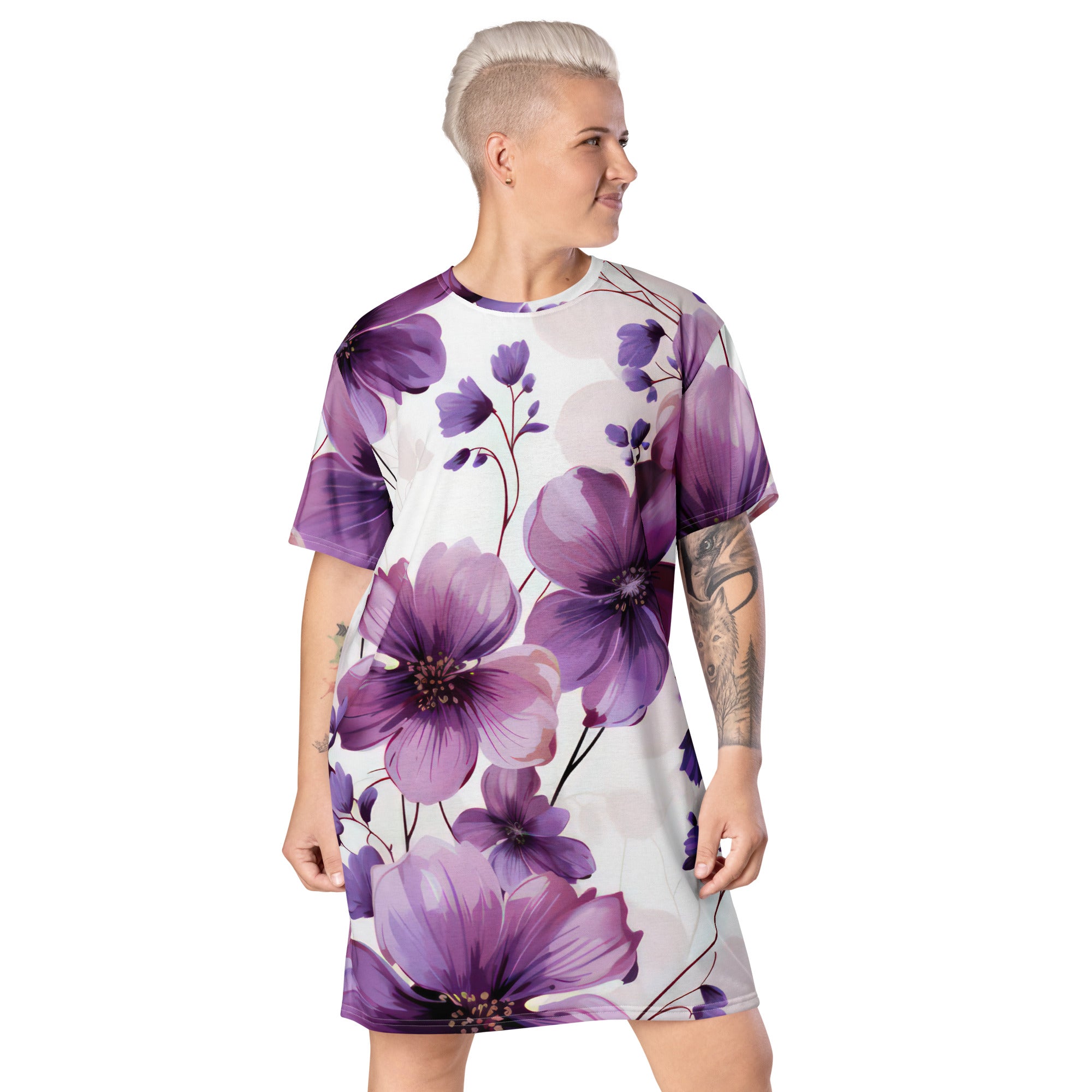 Womens Graphic T-shirt Dress featuring a vibrant purple botanical blooms design, showcasing its oversized fit and stylish look.