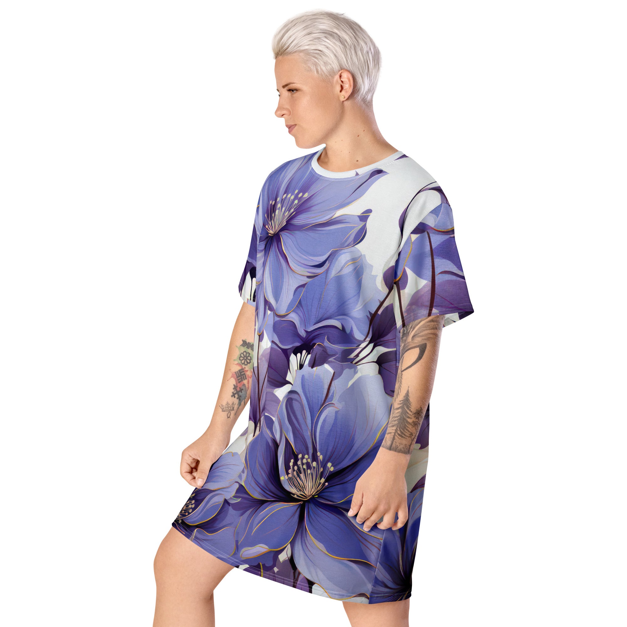 Womens Graphic T-shirt Dress featuring a vibrant purple botanical blooms print, showcasing its oversized fit and stylish design.