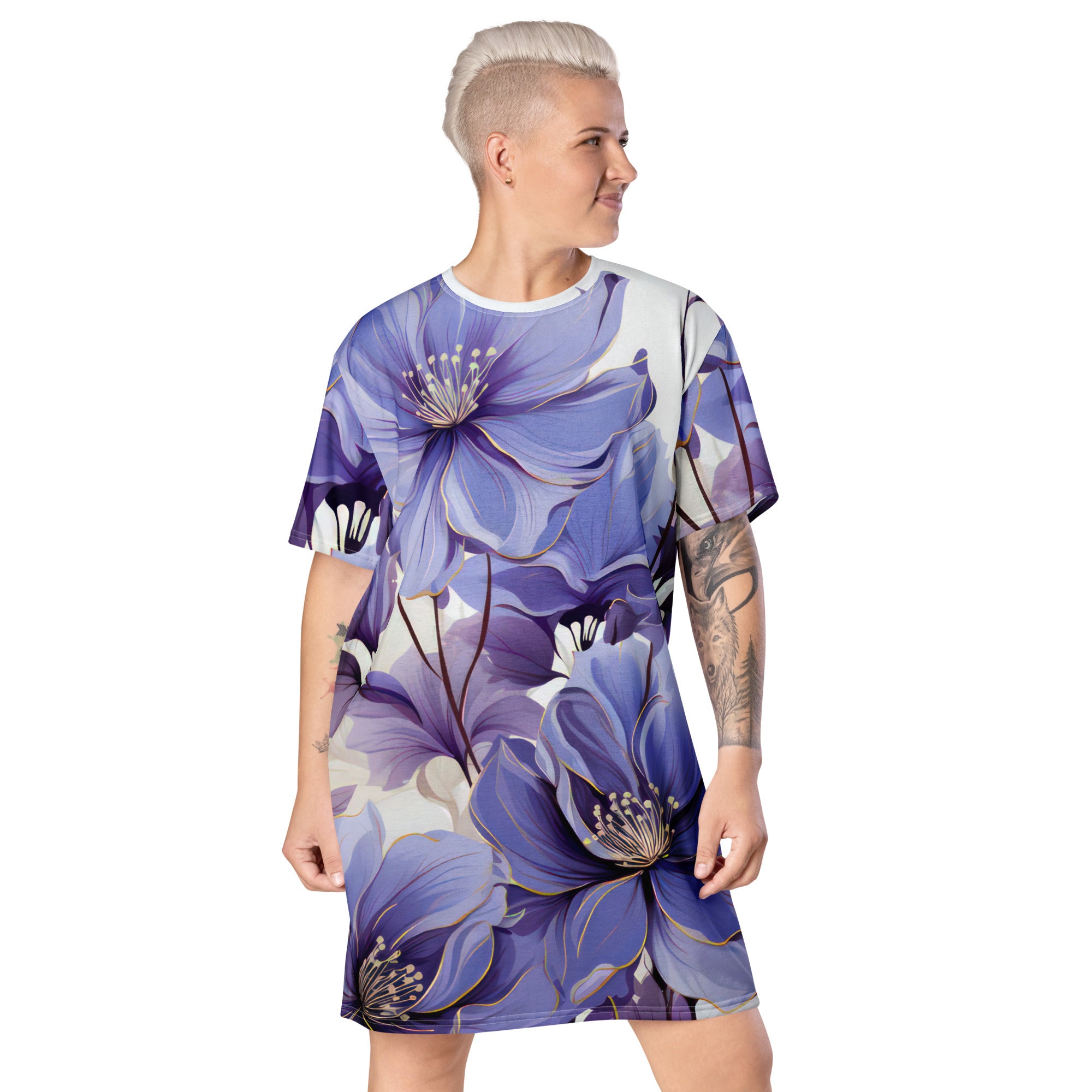 Womens Graphic T-shirt Dress featuring a vibrant purple botanical blooms print, showcasing its oversized fit and stylish design.