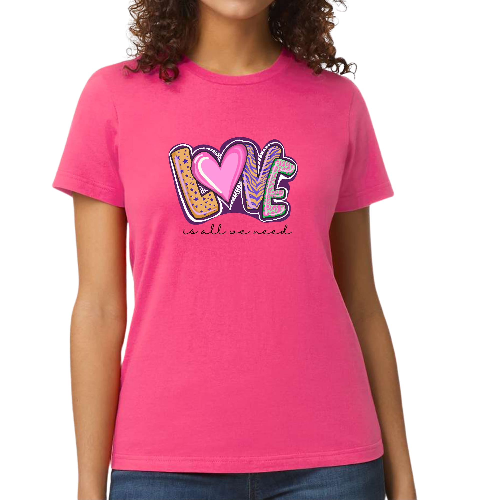 Womens Graphic T-shirt Say it Soul featuring the phrase 'Love is All We Need' in a vibrant artistic design, made from soft cotton fabric.