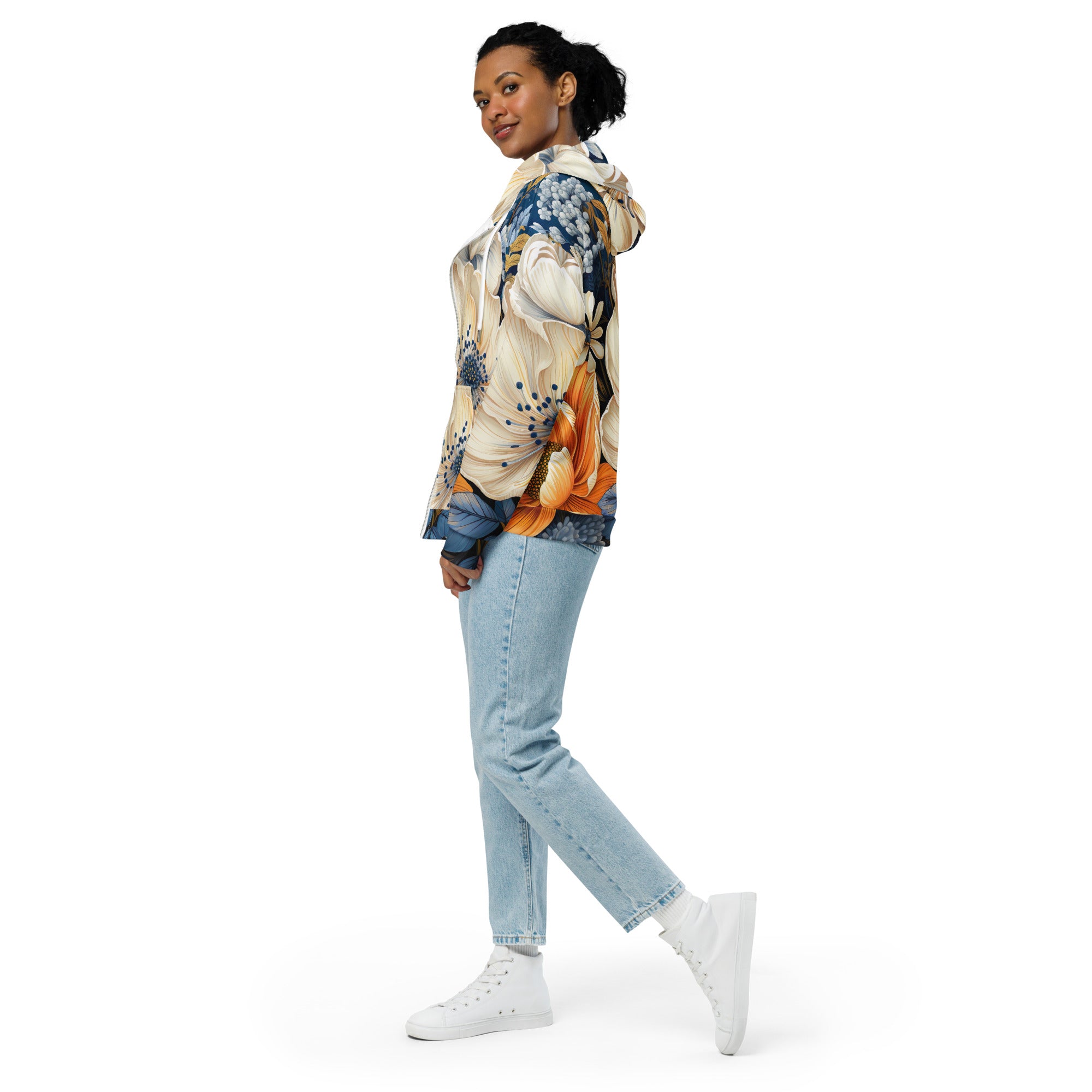 Womens Graphic Zip Hoodie featuring a vibrant blue floral print, showcasing its soft fabric and relaxed fit design.