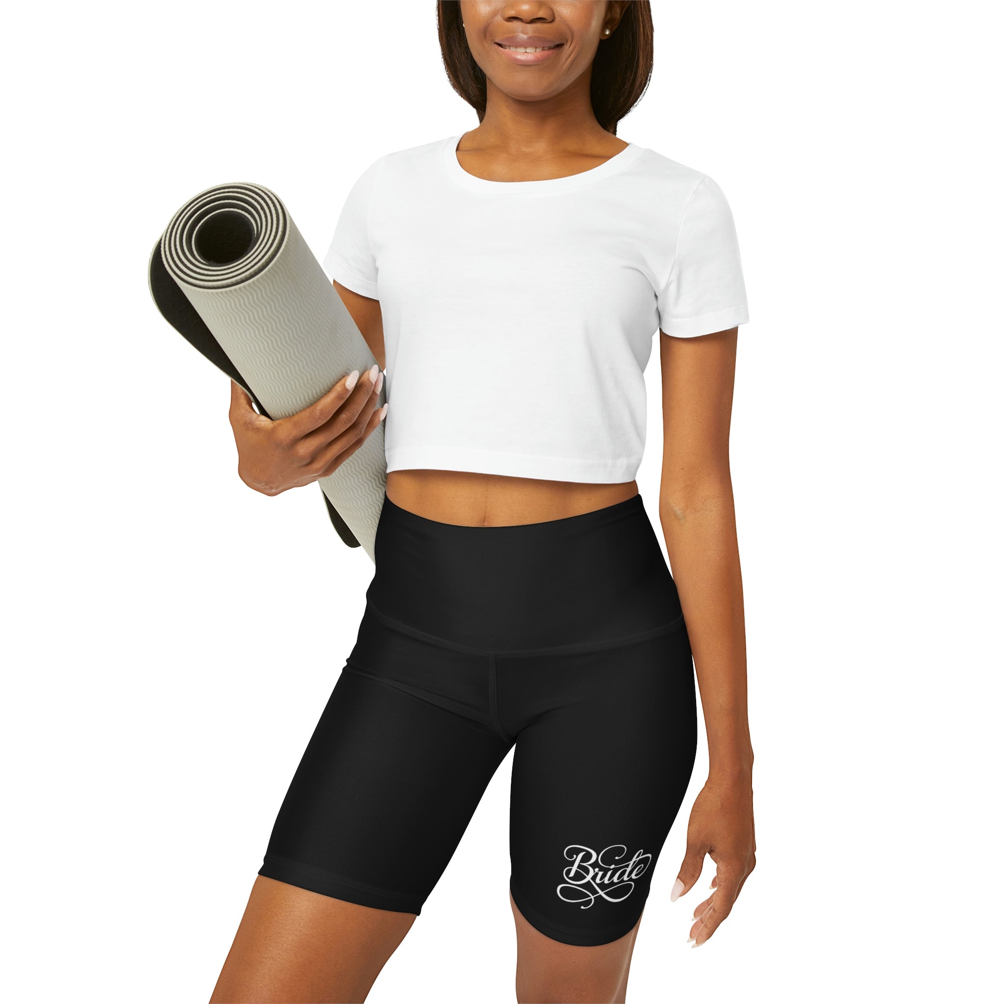 A pair of women's high waisted black yoga shorts with a wide waistband, showcasing a soft fabric ideal for workouts and casual wear.