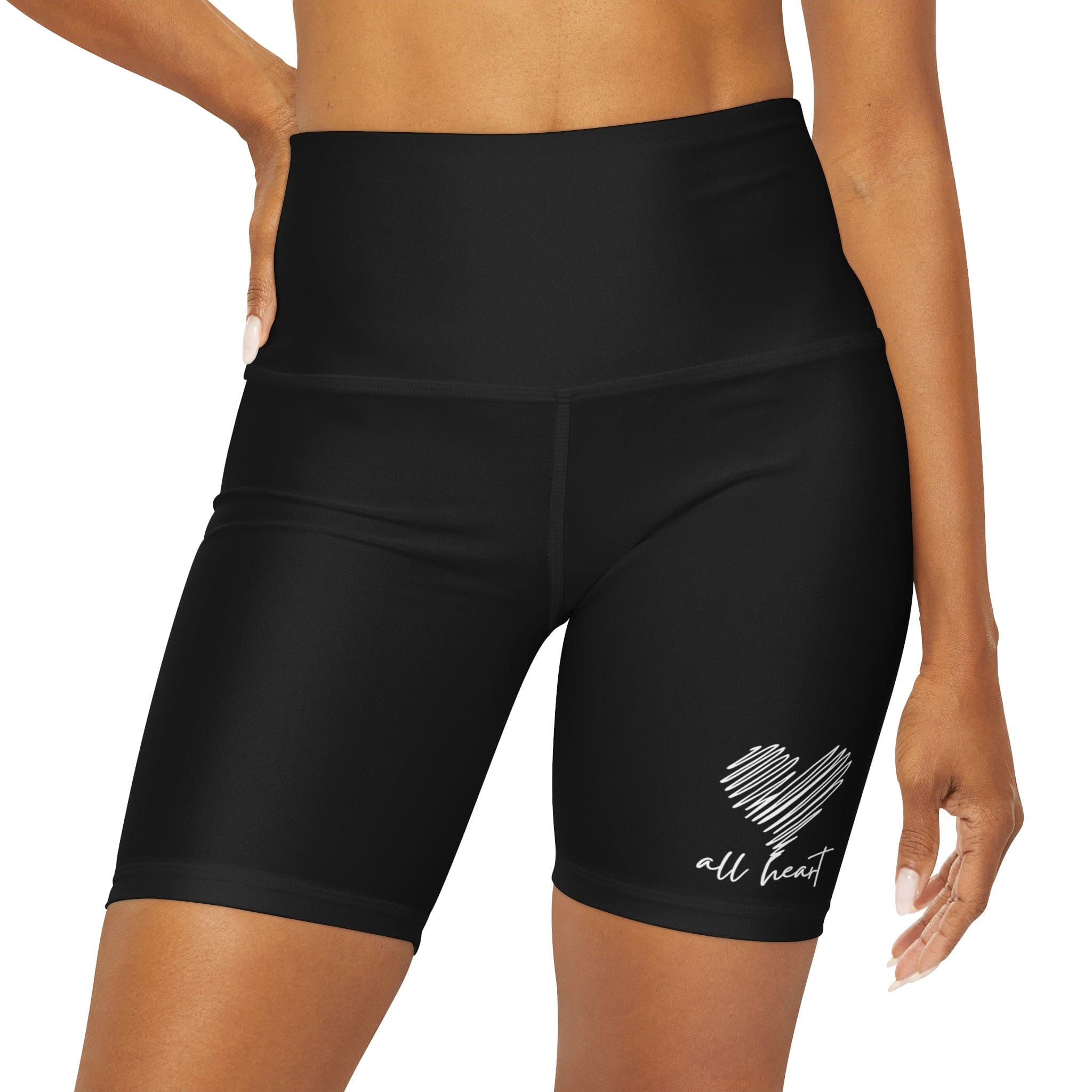 A pair of Women's High Waisted Black Yoga Shorts featuring a wide waistband and soft fabric, ideal for workouts and casual wear.