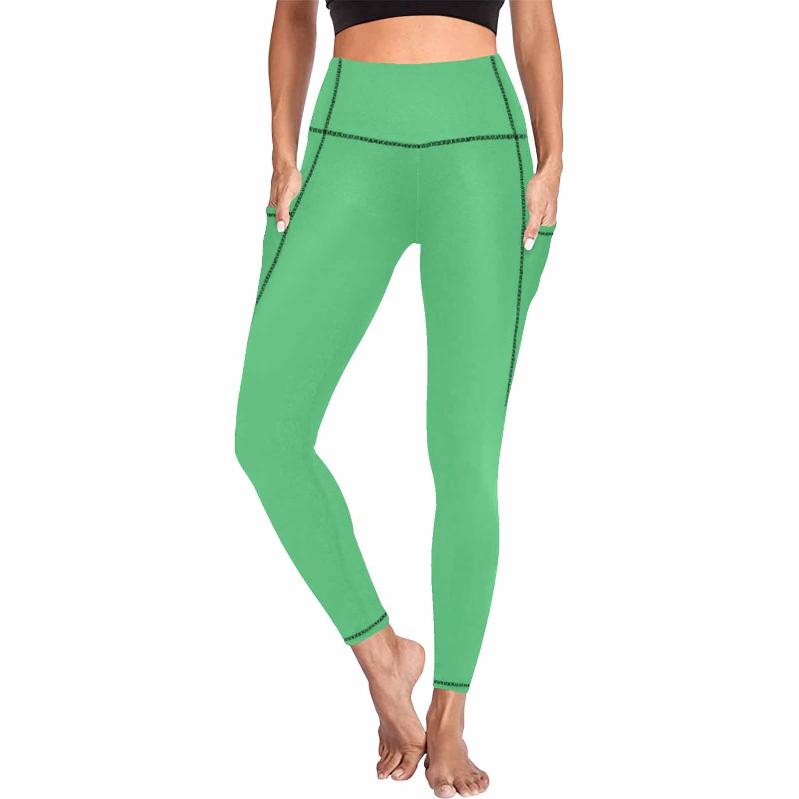 Emerald Green Women's Leggings with Pockets, showcasing lightweight fabric and stylish design.