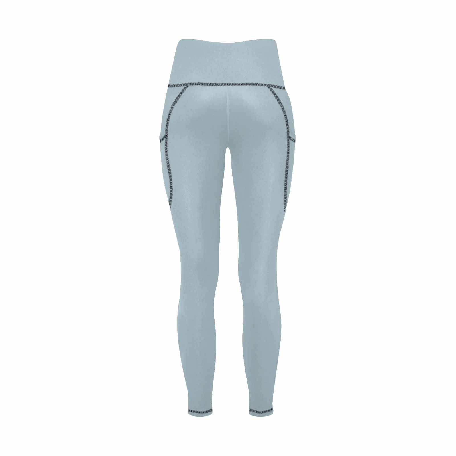 Pastel blue women's leggings with side pockets, designed for fitness and comfort.