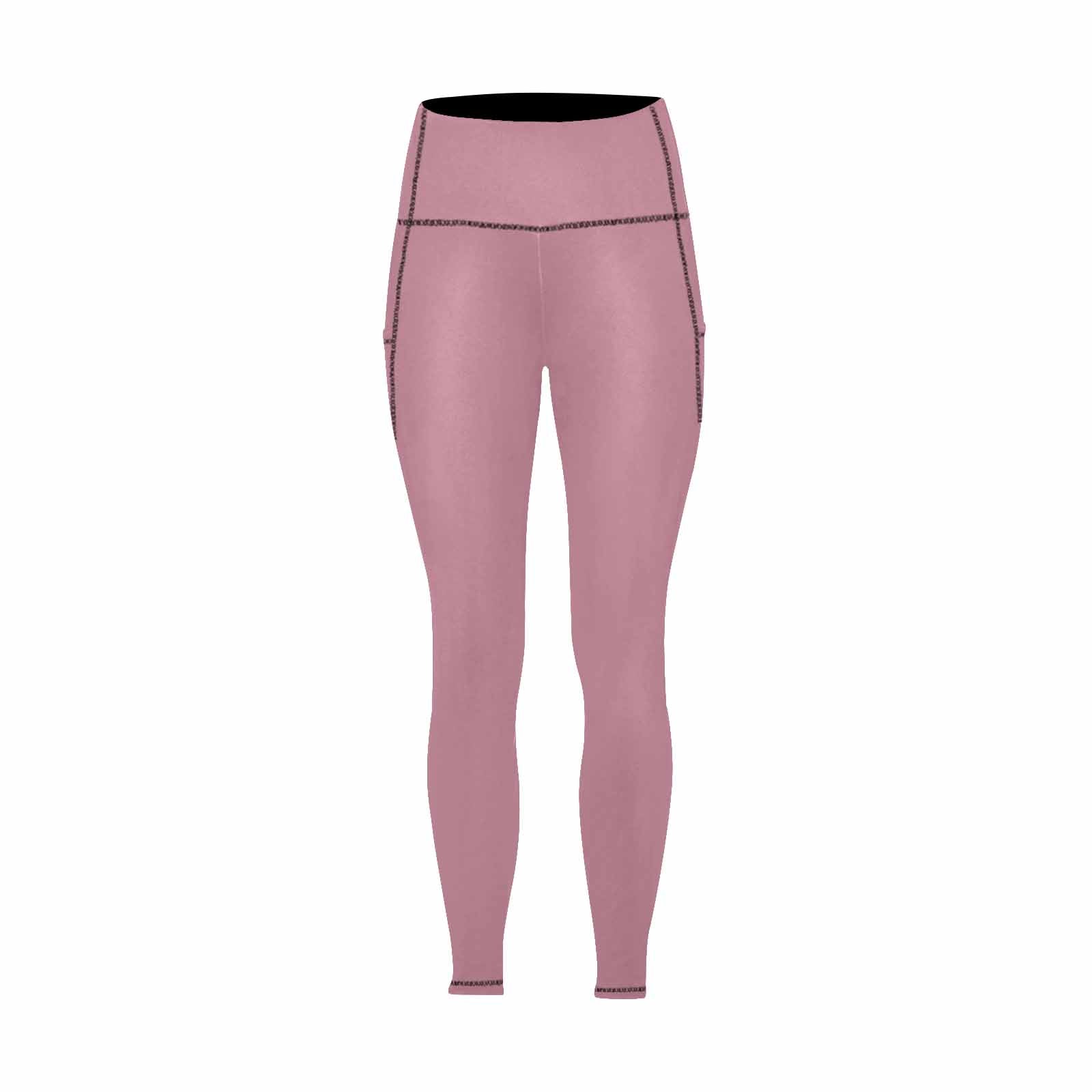 A pair of women's puce red leggings with pockets, showcasing a stylish and comfortable design suitable for fitness activities.