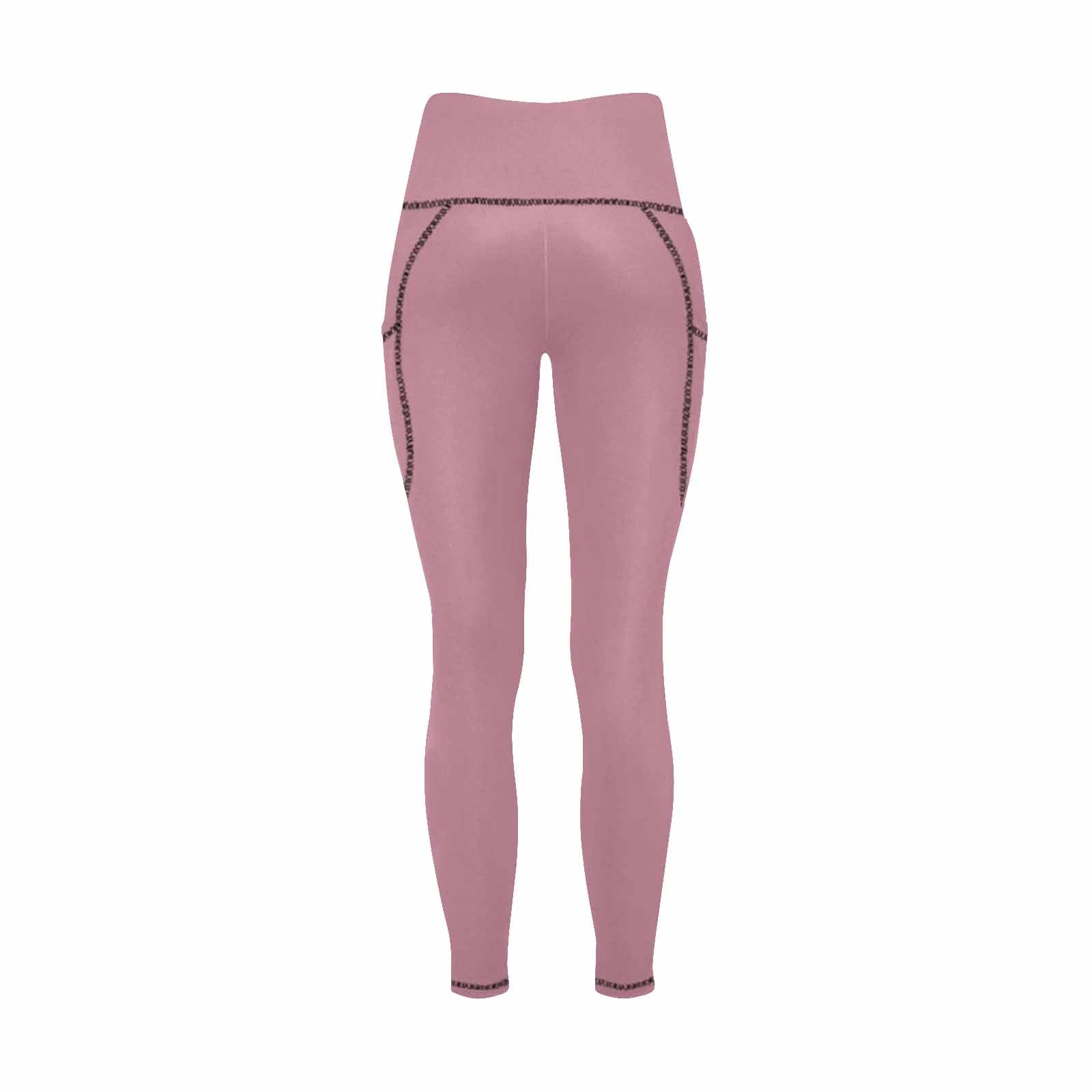 A pair of women's puce red leggings with pockets, showcasing a stylish and comfortable design suitable for fitness activities.