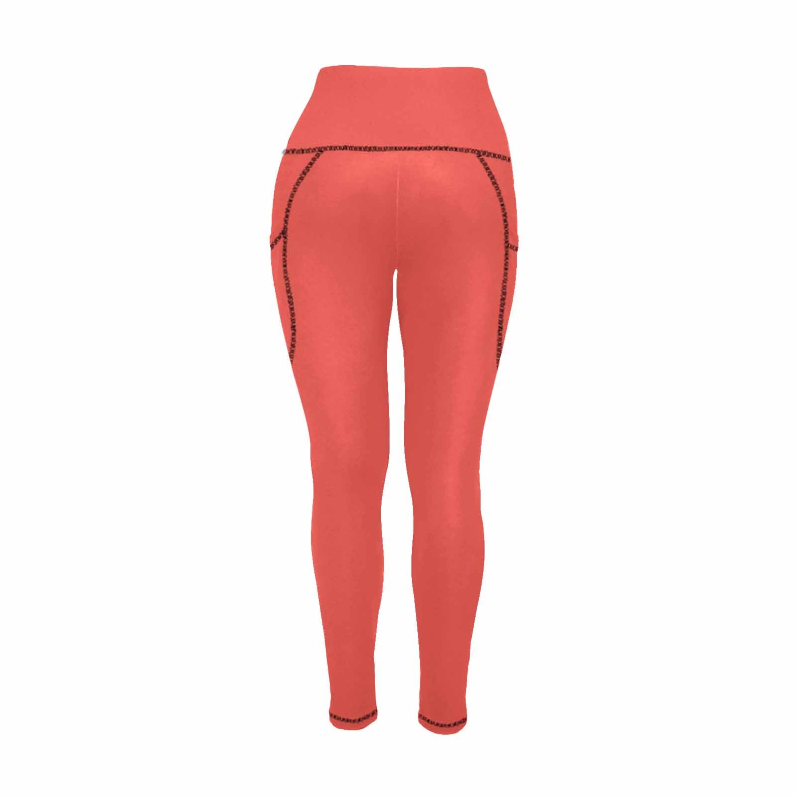 A pair of women's red orange leggings with side pockets, showcasing a stylish and comfortable design for fitness activities.