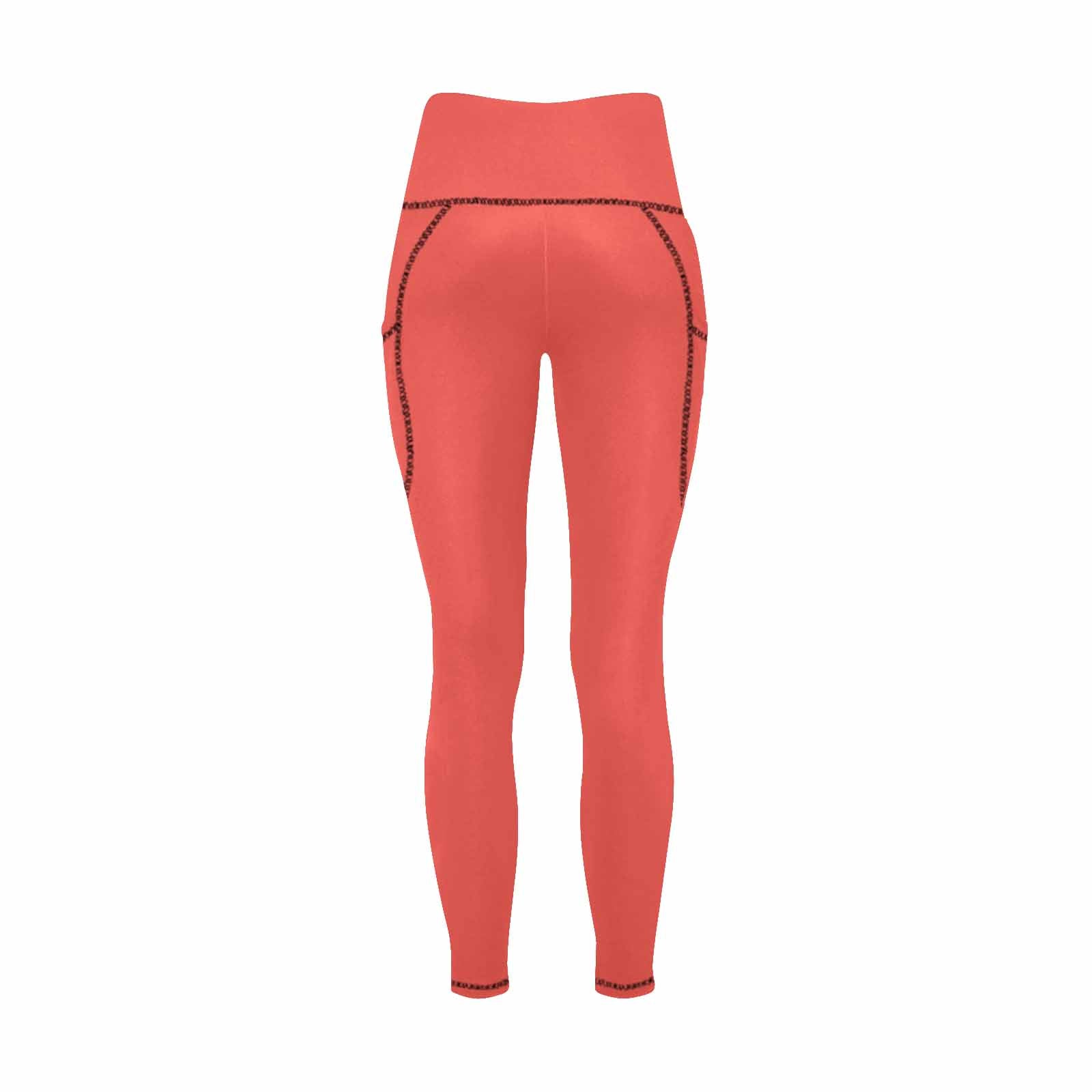 A pair of women's red orange leggings with side pockets, showcasing a stylish and comfortable design for fitness activities.