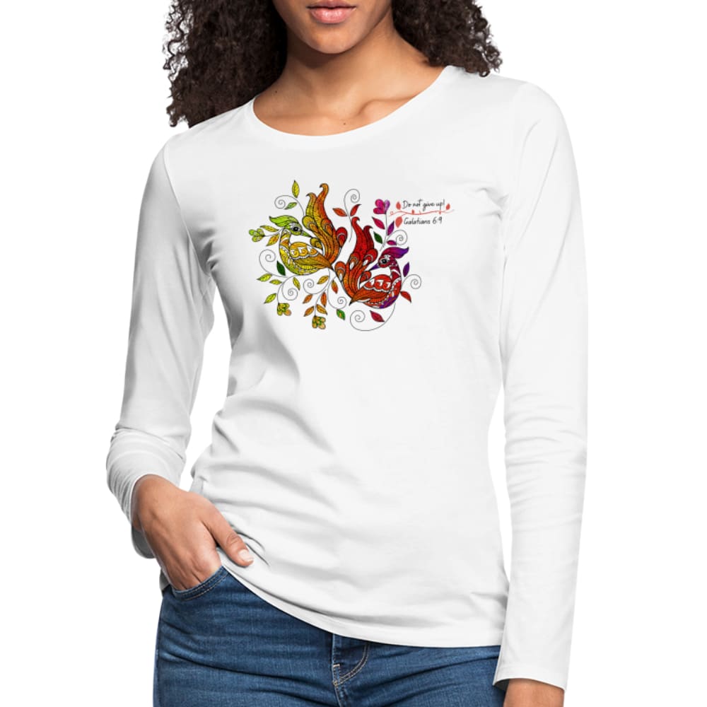 A vibrant women's long sleeve graphic tee featuring a colorful peacock print and affirmations, showcasing its soft cotton fabric and stylish design.