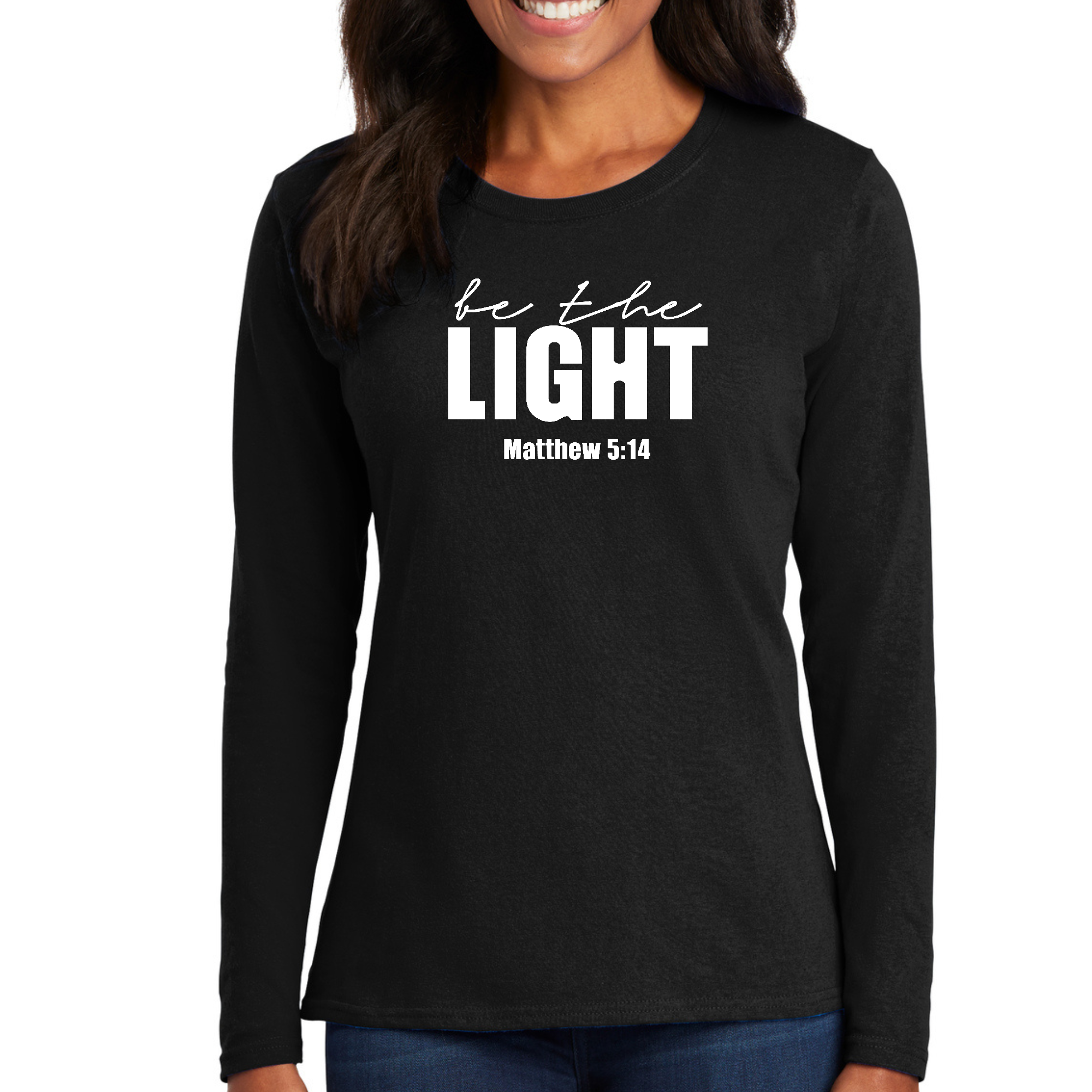 Women's Long Sleeve Graphic T-shirt with 'Be the Light' inspirational art illustration, showcasing vibrant colors and a comfortable fit.