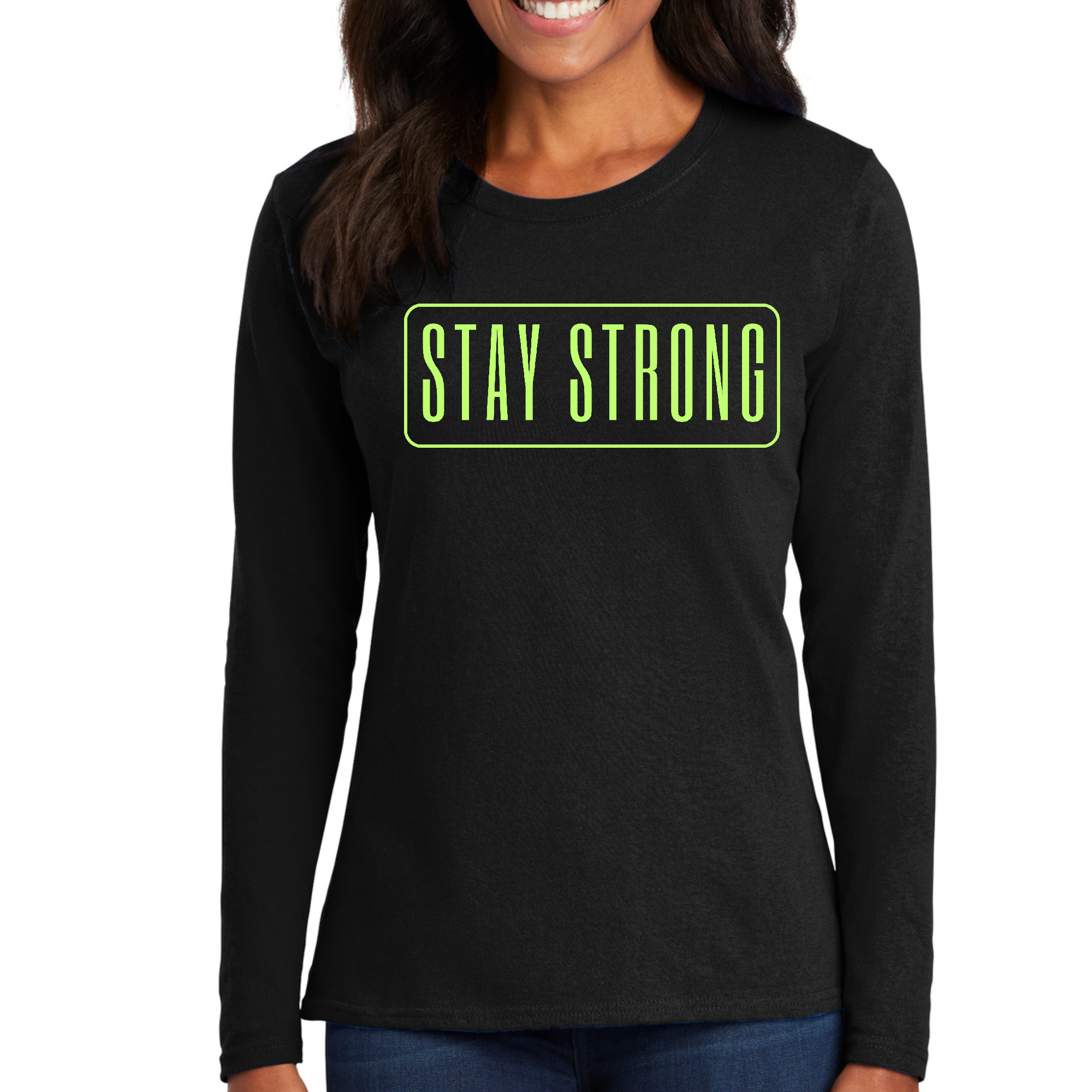 Women's Long Sleeve Graphic T-shirt featuring a vibrant neon 'Stay Strong' print on soft preshrunk cotton fabric.