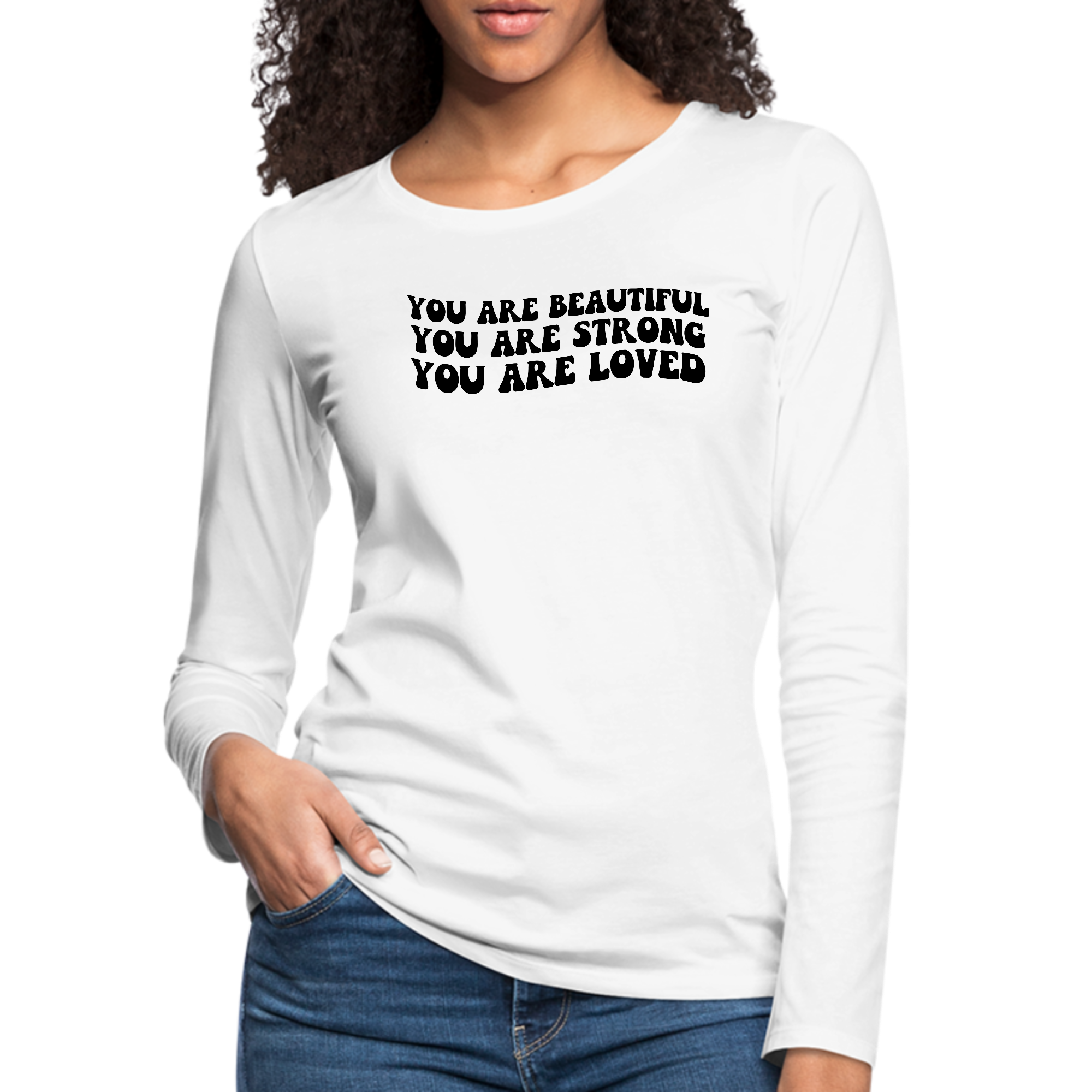 Women's long sleeve graphic t-shirt featuring the phrase 'You Are Beautiful Strong Loved' in bold lettering, made from soft cotton material.