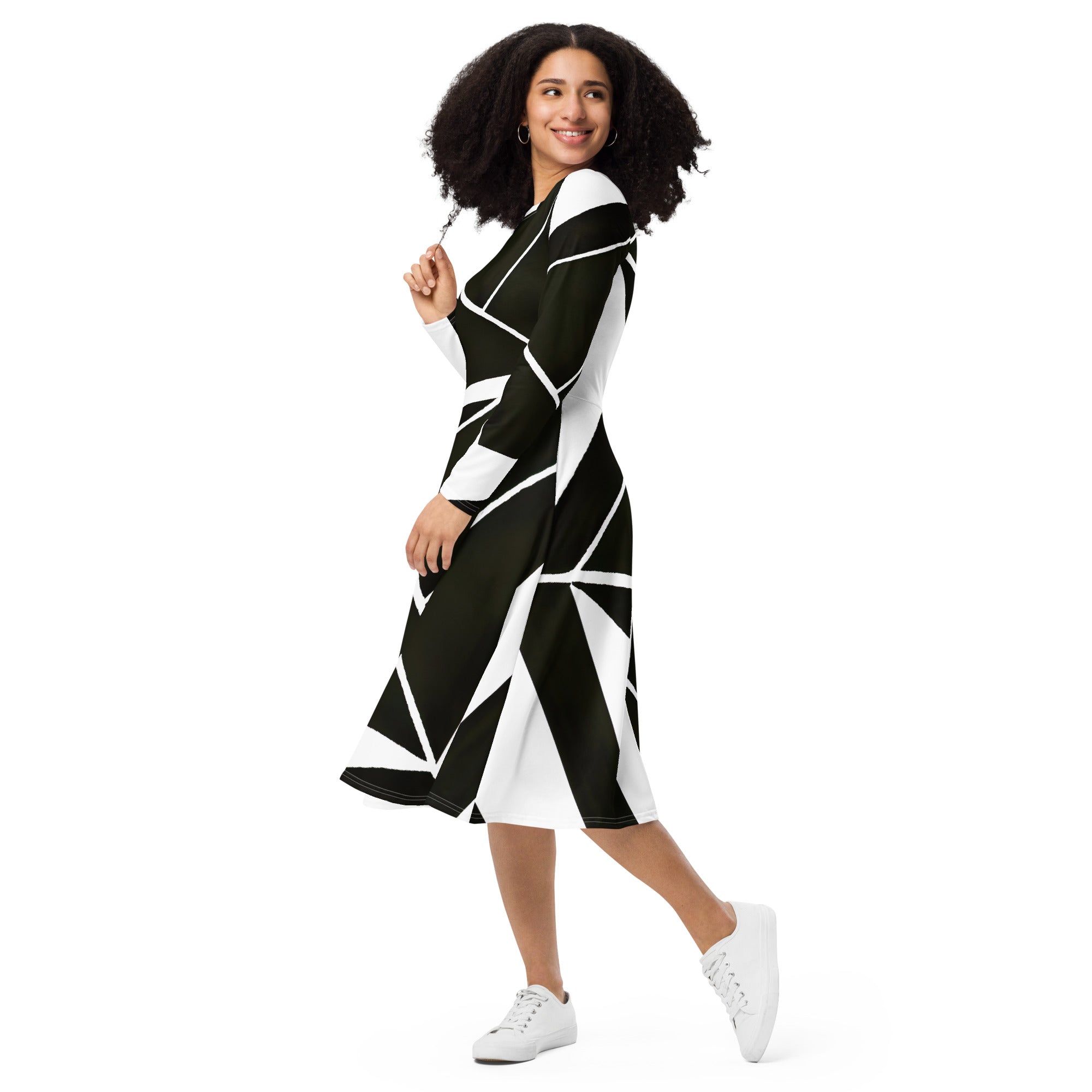 Womens Long Sleeve Midi Dress featuring a black and white geometric pattern, showcasing its fitted waist, flared bottom, and side pockets.