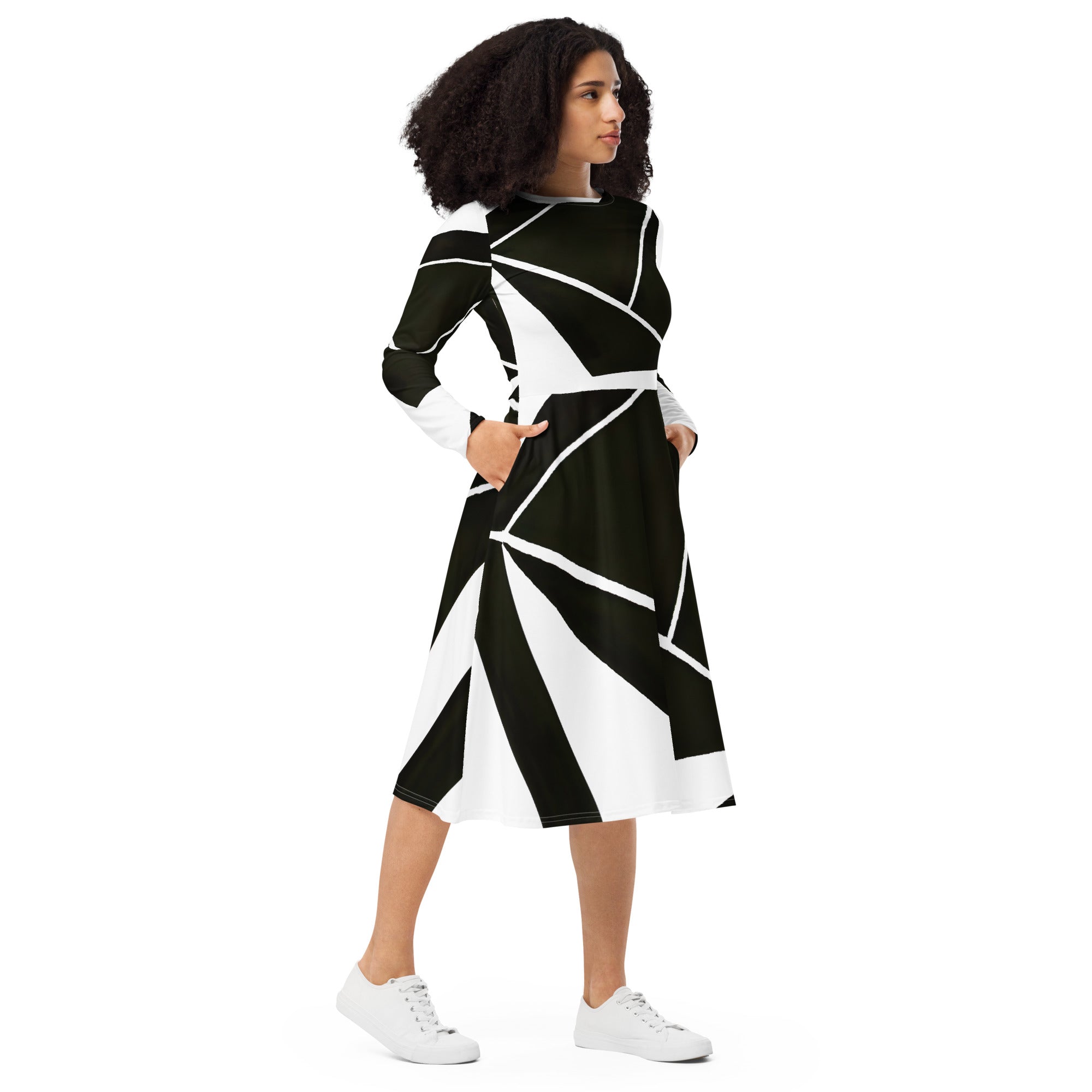 Womens Long Sleeve Midi Dress featuring a black and white geometric pattern, showcasing its fitted waist, flared bottom, and side pockets.