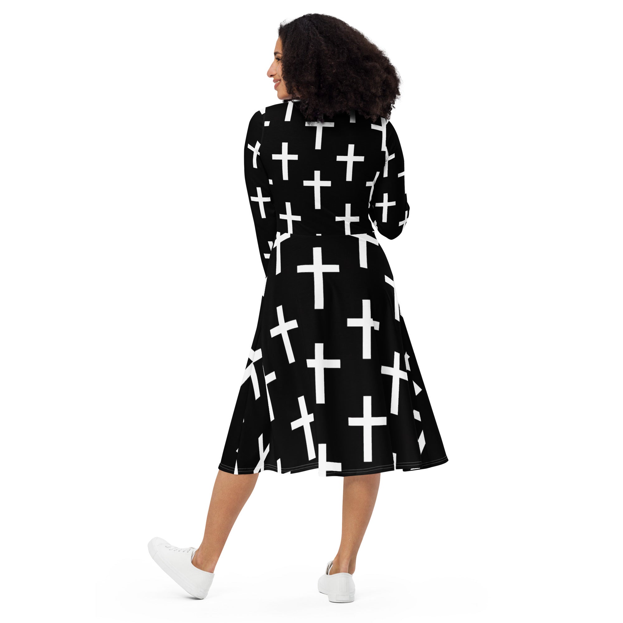 Womens Long Sleeve Midi Dress featuring a black and white cross print, showcasing its elegant design and comfortable fit.