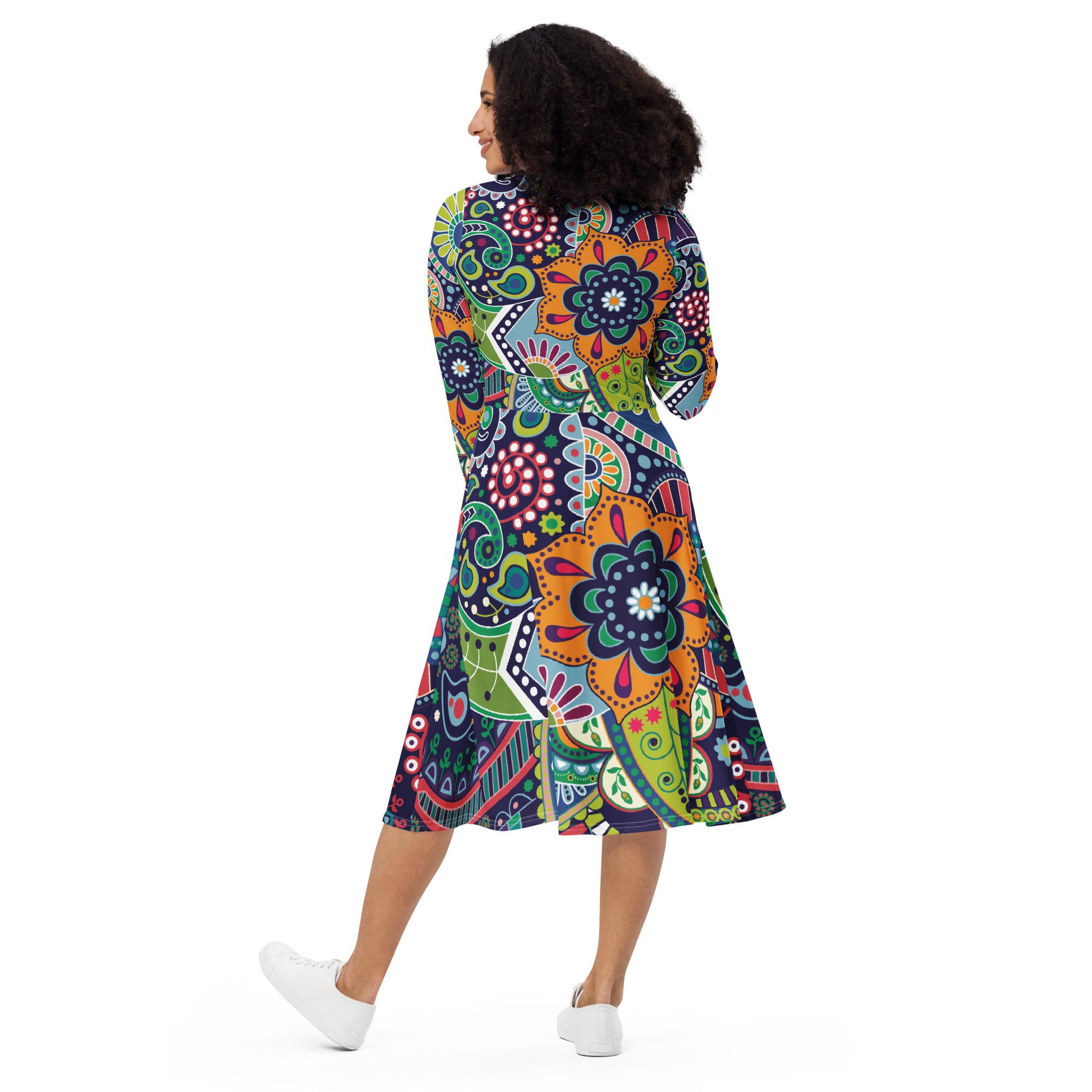 Womens Long Sleeve Midi Dress in Floral Paisley design, showcasing fitted waist, flared bottom, and side pockets.