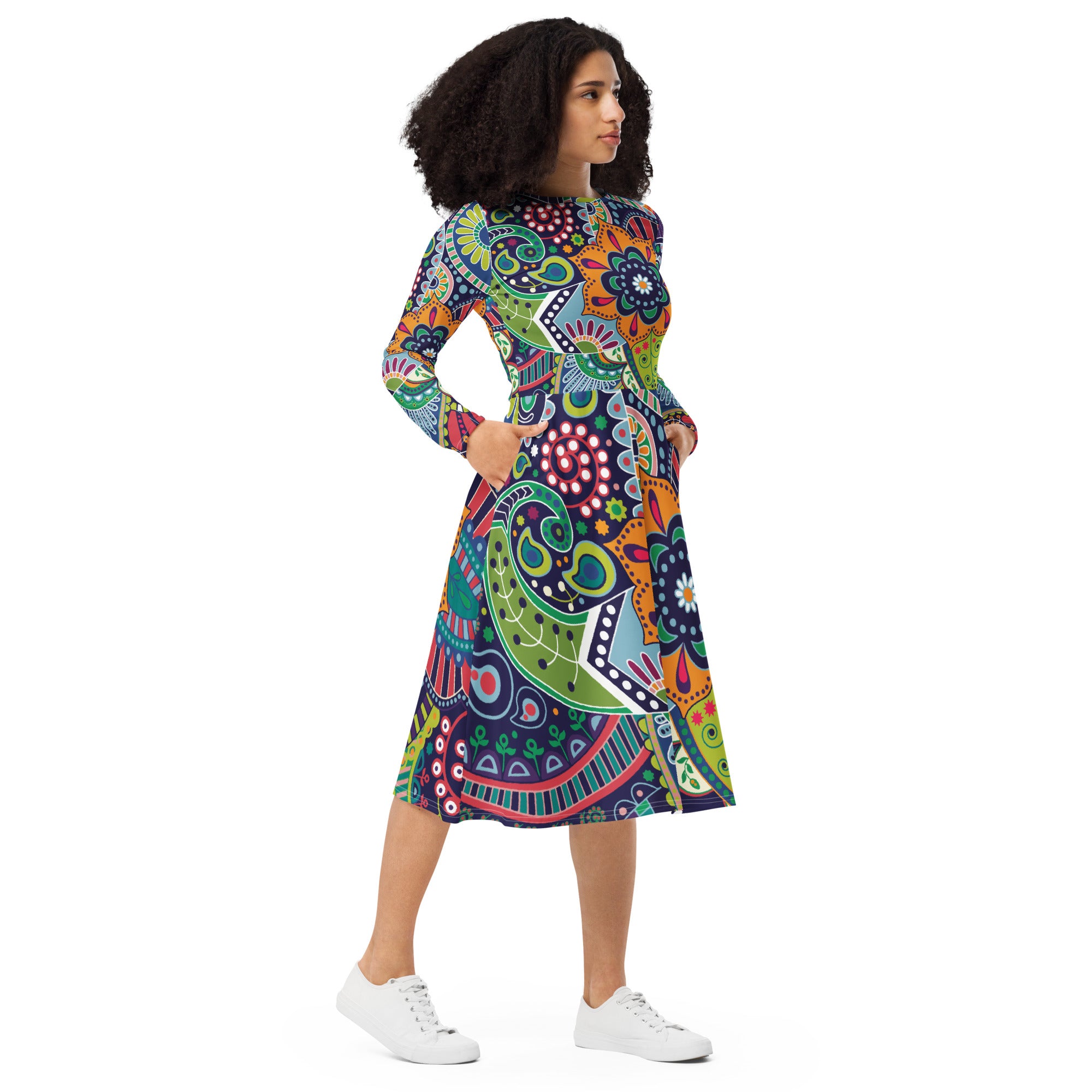 Womens Long Sleeve Midi Dress in Floral Paisley design, showcasing fitted waist, flared bottom, and side pockets.