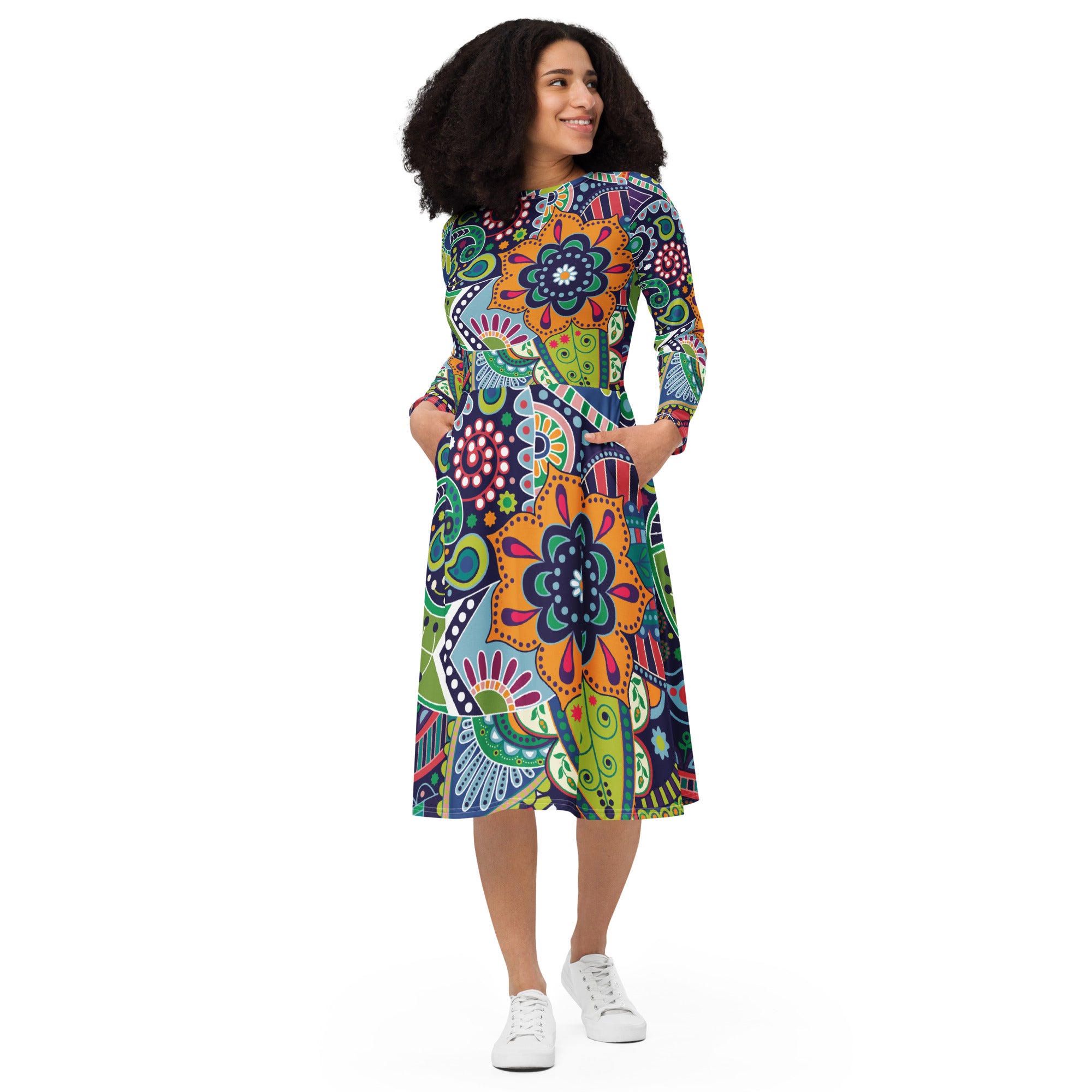 Womens Long Sleeve Midi Dress in Floral Paisley design, showcasing fitted waist, flared bottom, and side pockets.