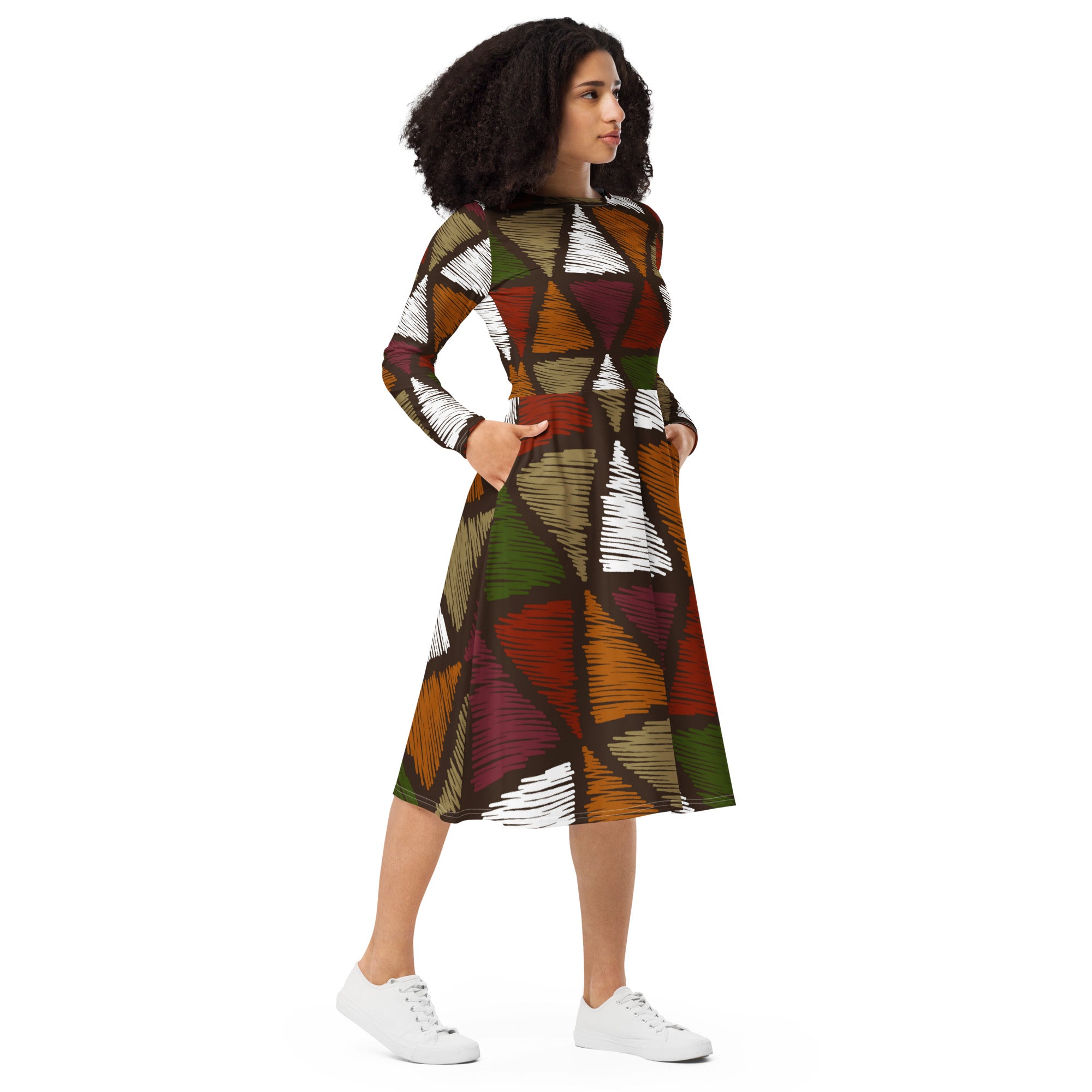 Womens Long Sleeve Midi Dress featuring a vibrant red and green geometric pattern, showcasing its flared bottom and side pockets.