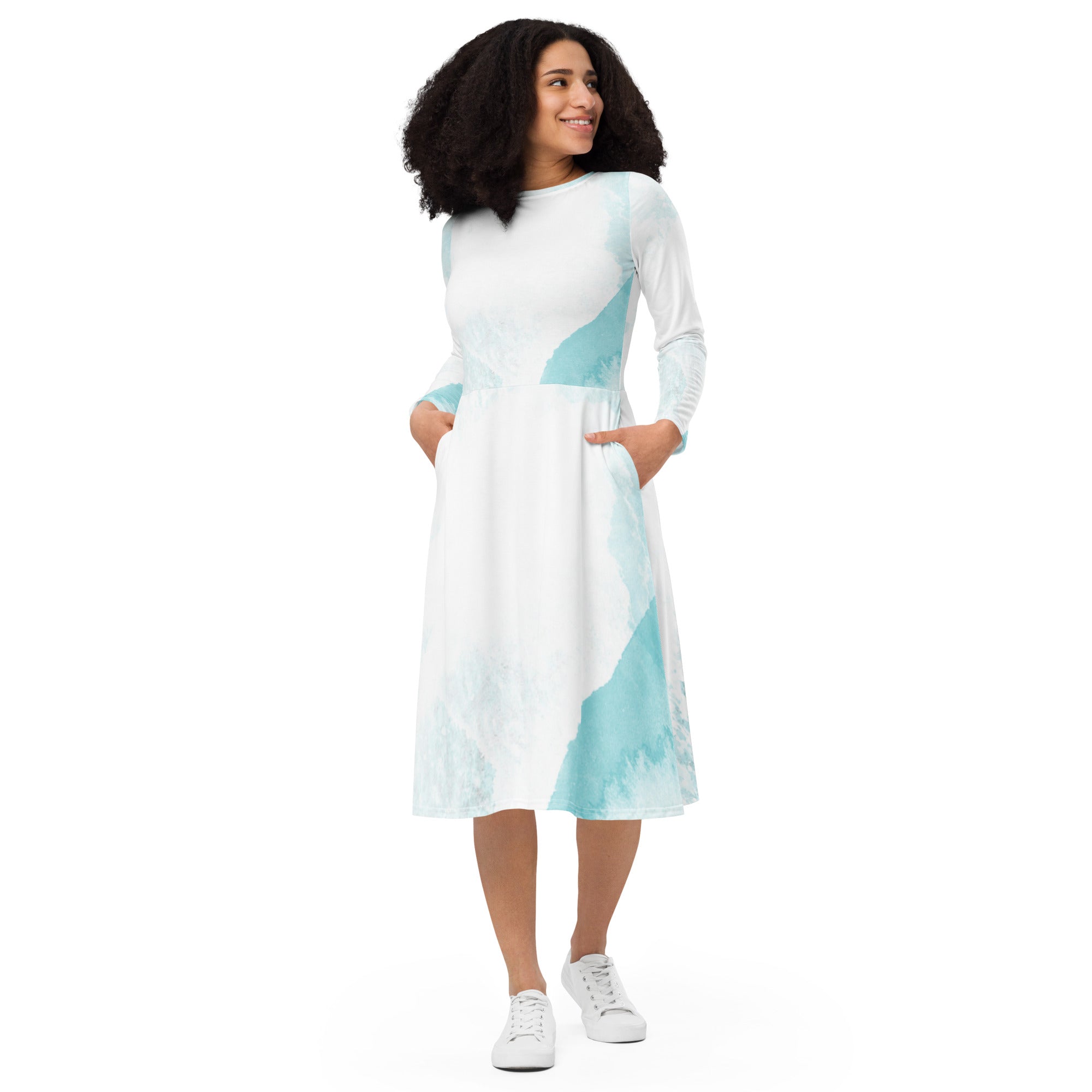 Womens Long Sleeve Midi Dress in ocean blue and white abstract print, featuring long sleeves, fitted waist, flared bottom, and side pockets.