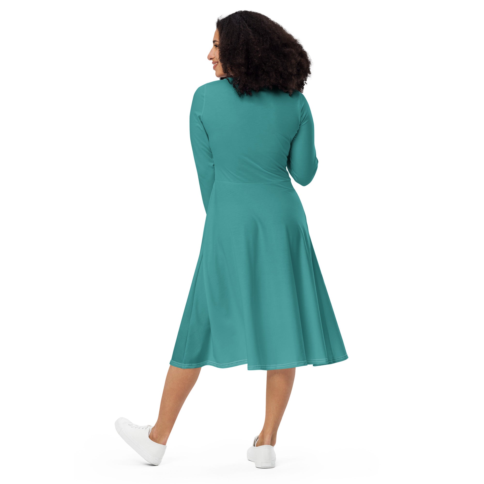 Womens Long Sleeve Midi Dress in Teal Green featuring a boat neckline, long sleeves, and side pockets, showcasing a flattering fitted waist and flared bottom.