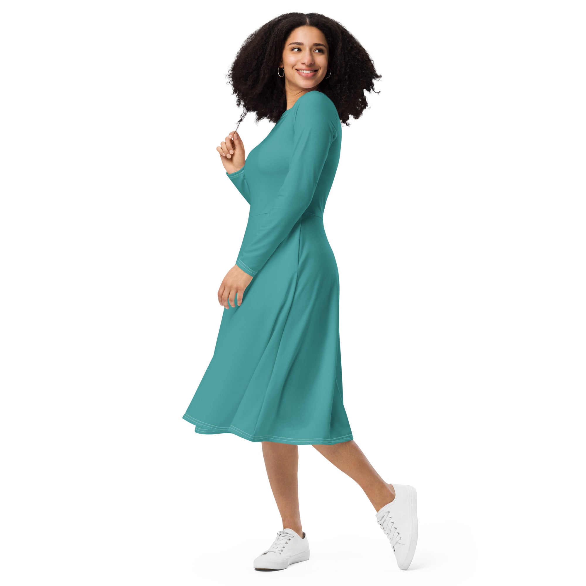 Womens Long Sleeve Midi Dress in Teal Green featuring a boat neckline, long sleeves, and side pockets, showcasing a flattering fitted waist and flared bottom.